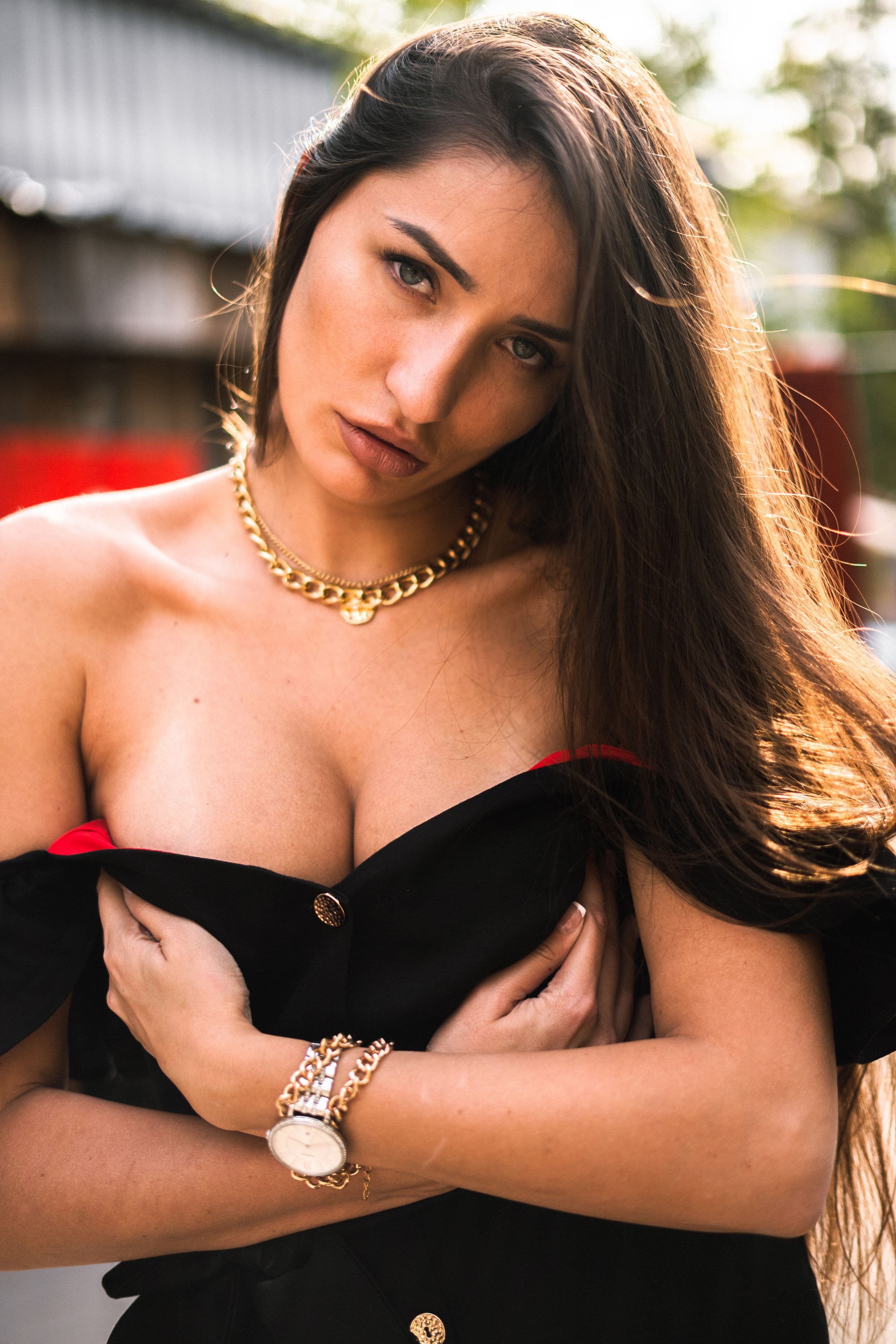 a girl in a black dress creating a romantic mood in a Moscow courtyard