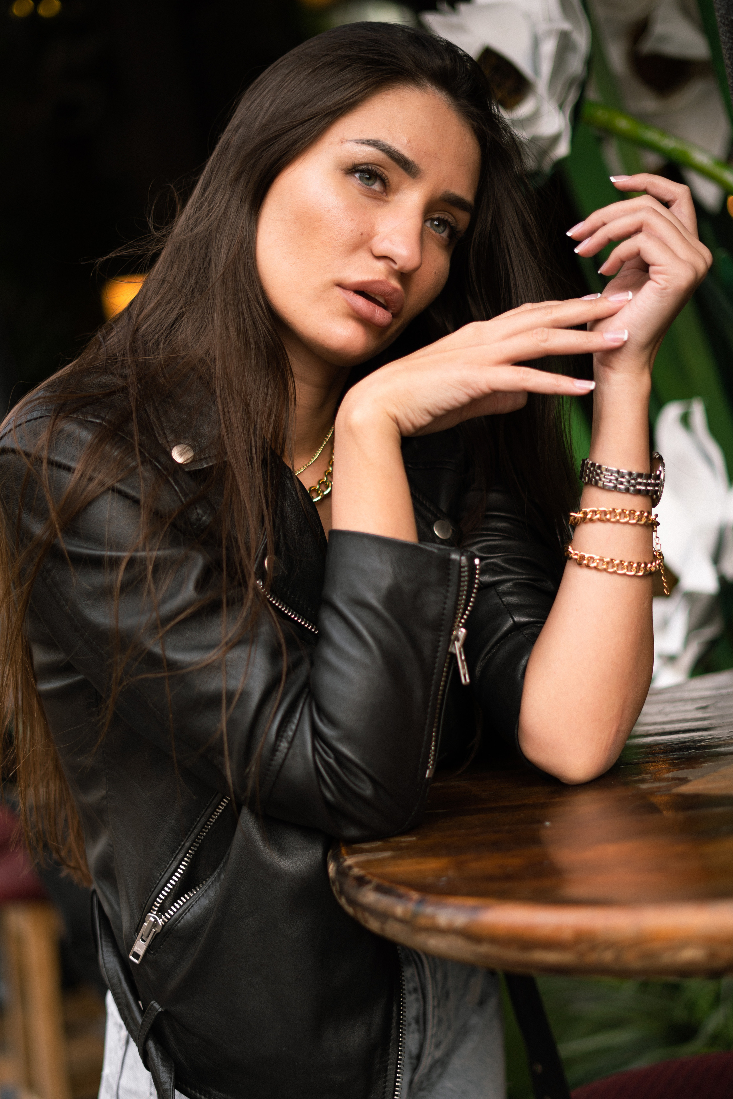 a beautiful dark-haired girl against the backdrop of the bright lights of Moscow
