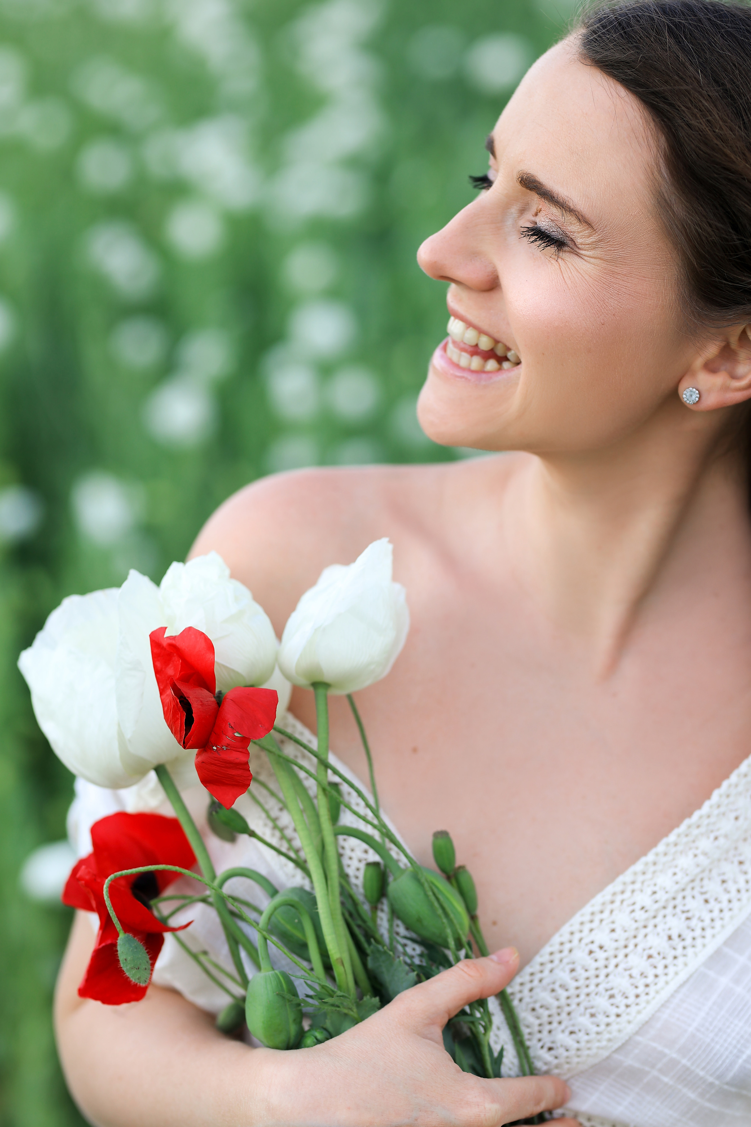 Fields of roses, irises and white poppies