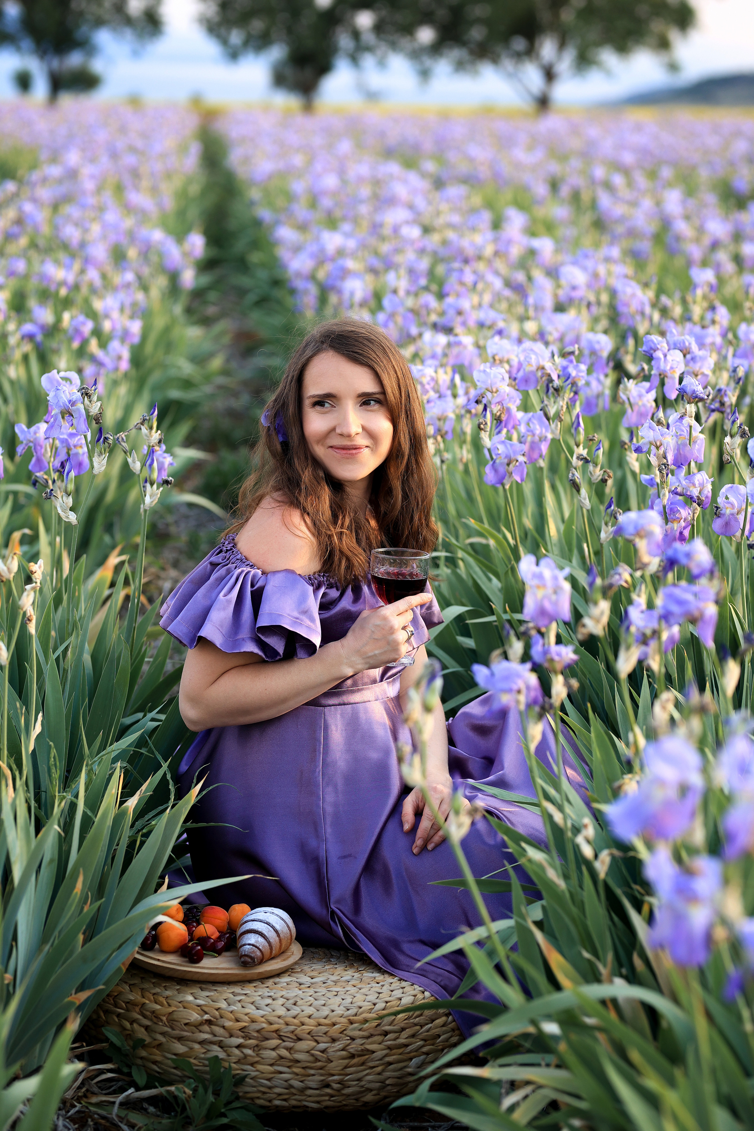 Fields of roses, irises and white poppies