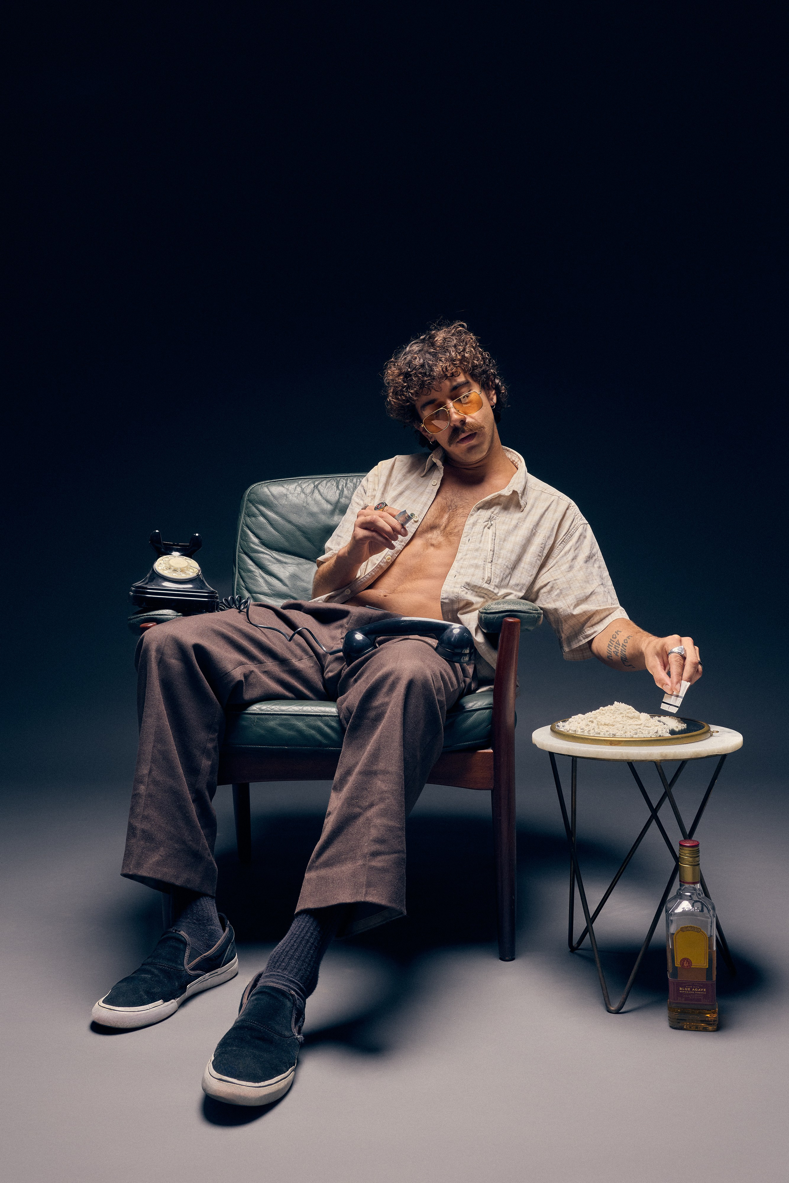 Artistic studio photography with vintage character pose