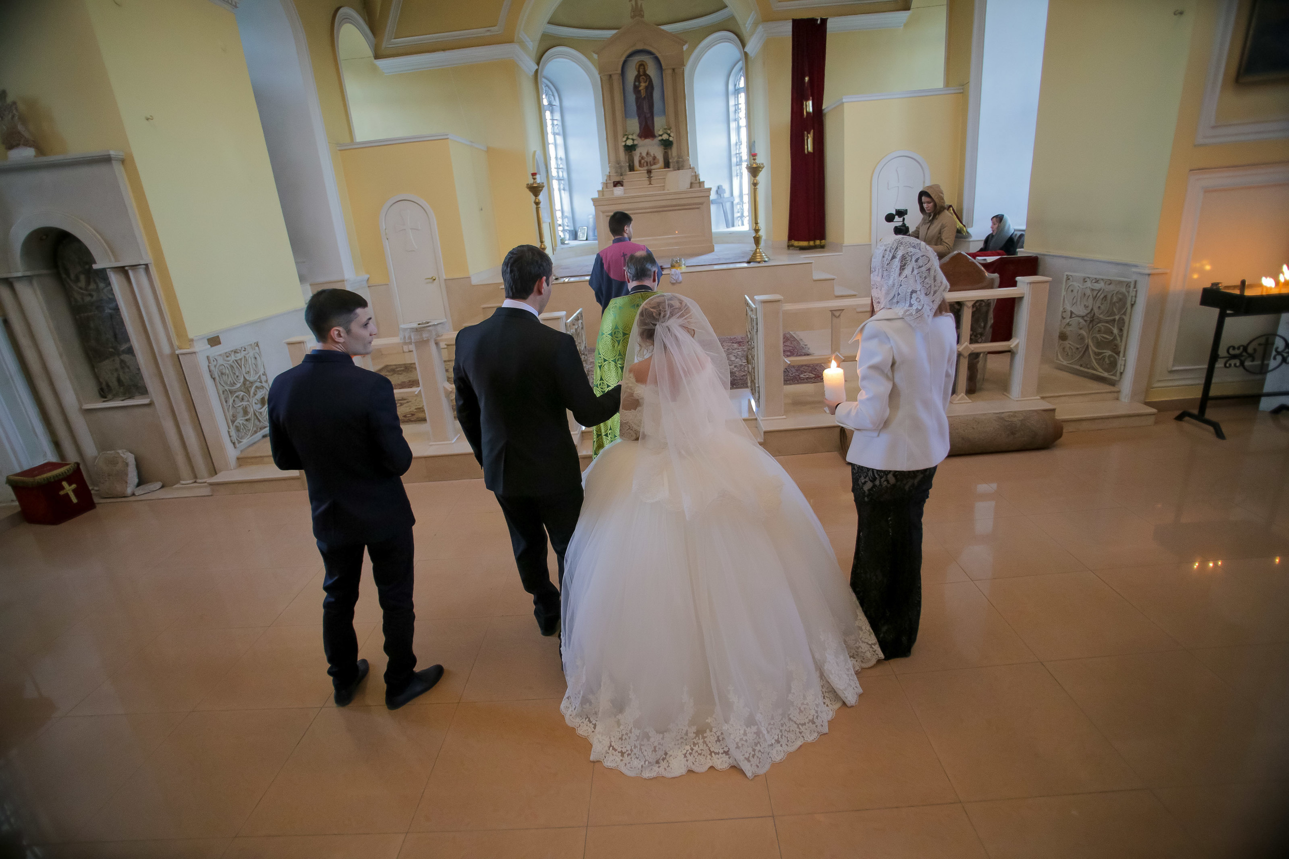 Фотограф церковных обрядов в Ростове-на-Дону. Профессиональная фото и. Максим Матвийченко и Виктория Басова профессионалы своего дела