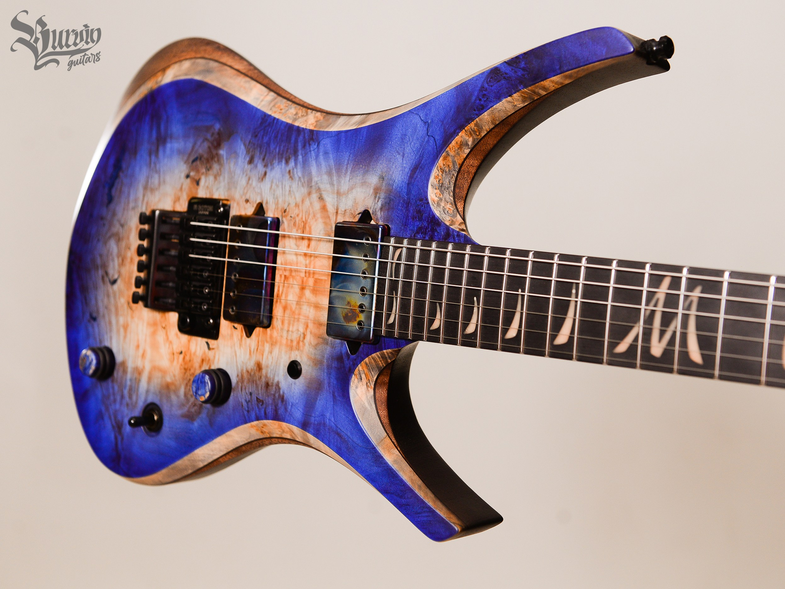 022 AXES. Master of making guitars and basses to order