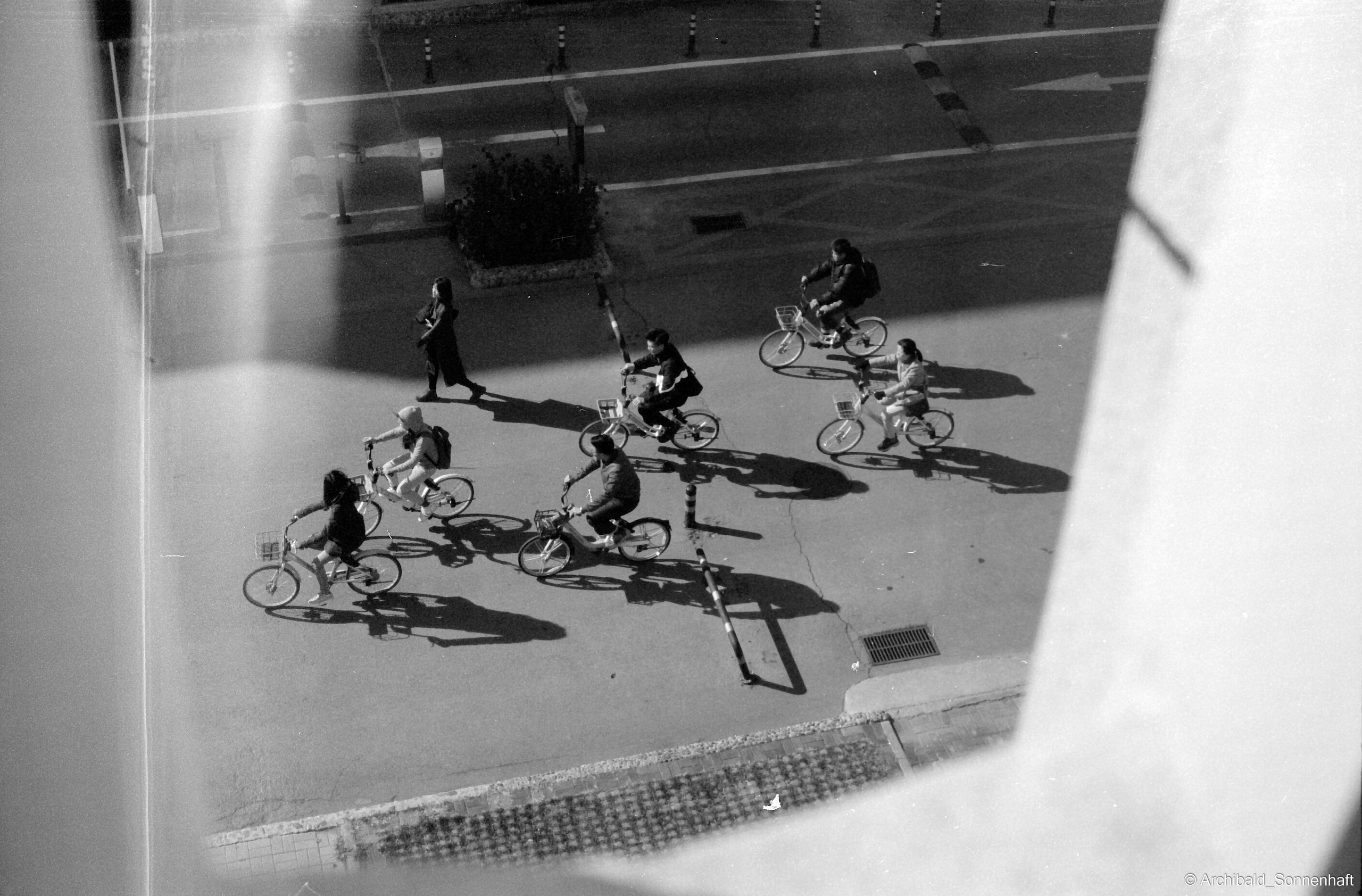 Yep, using film. Photographer in Guangzhou, China. Archibald Sonnenhaft