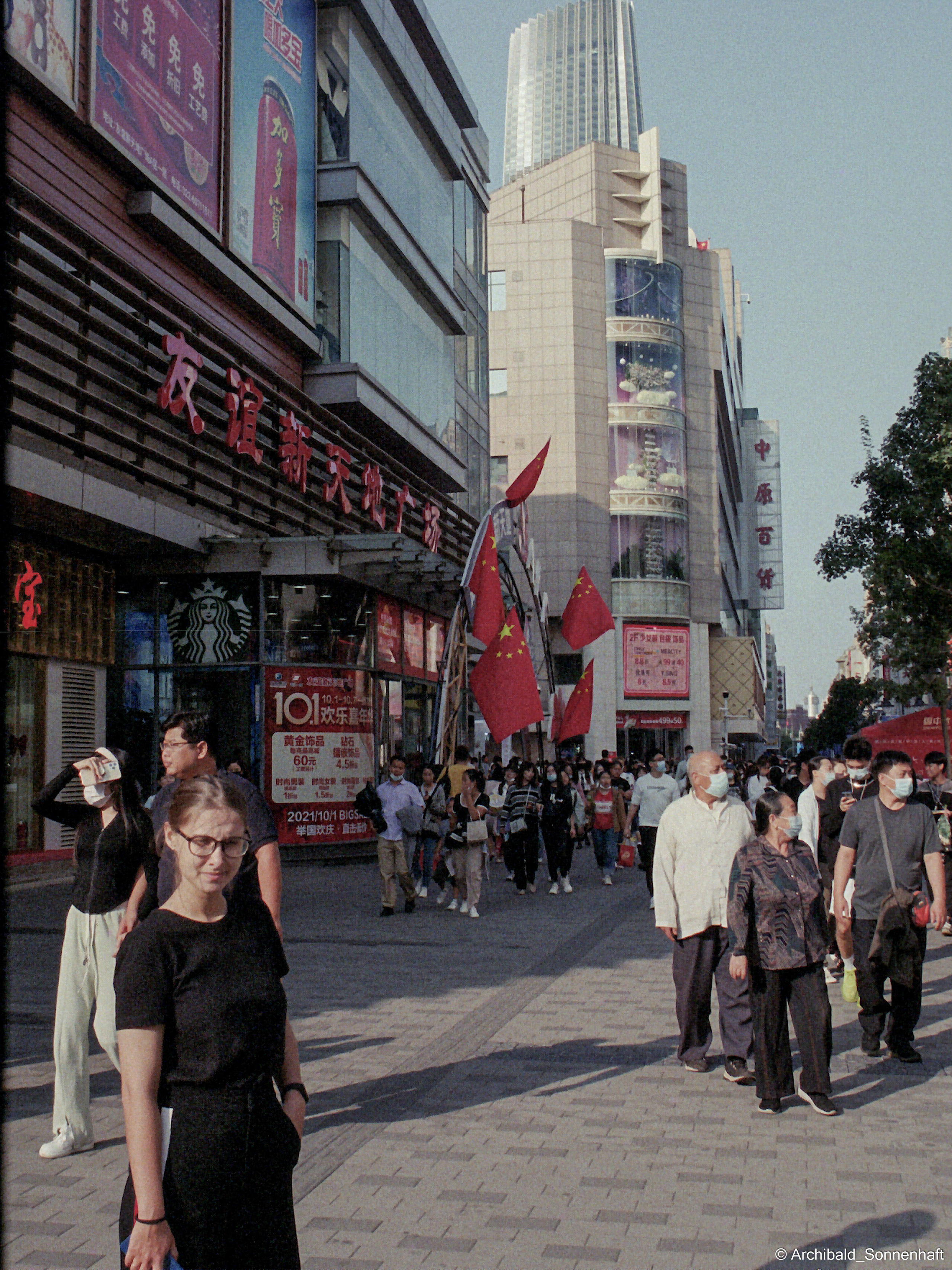Yep, using film. Photographer in Guangzhou, China. Archibald Sonnenhaft