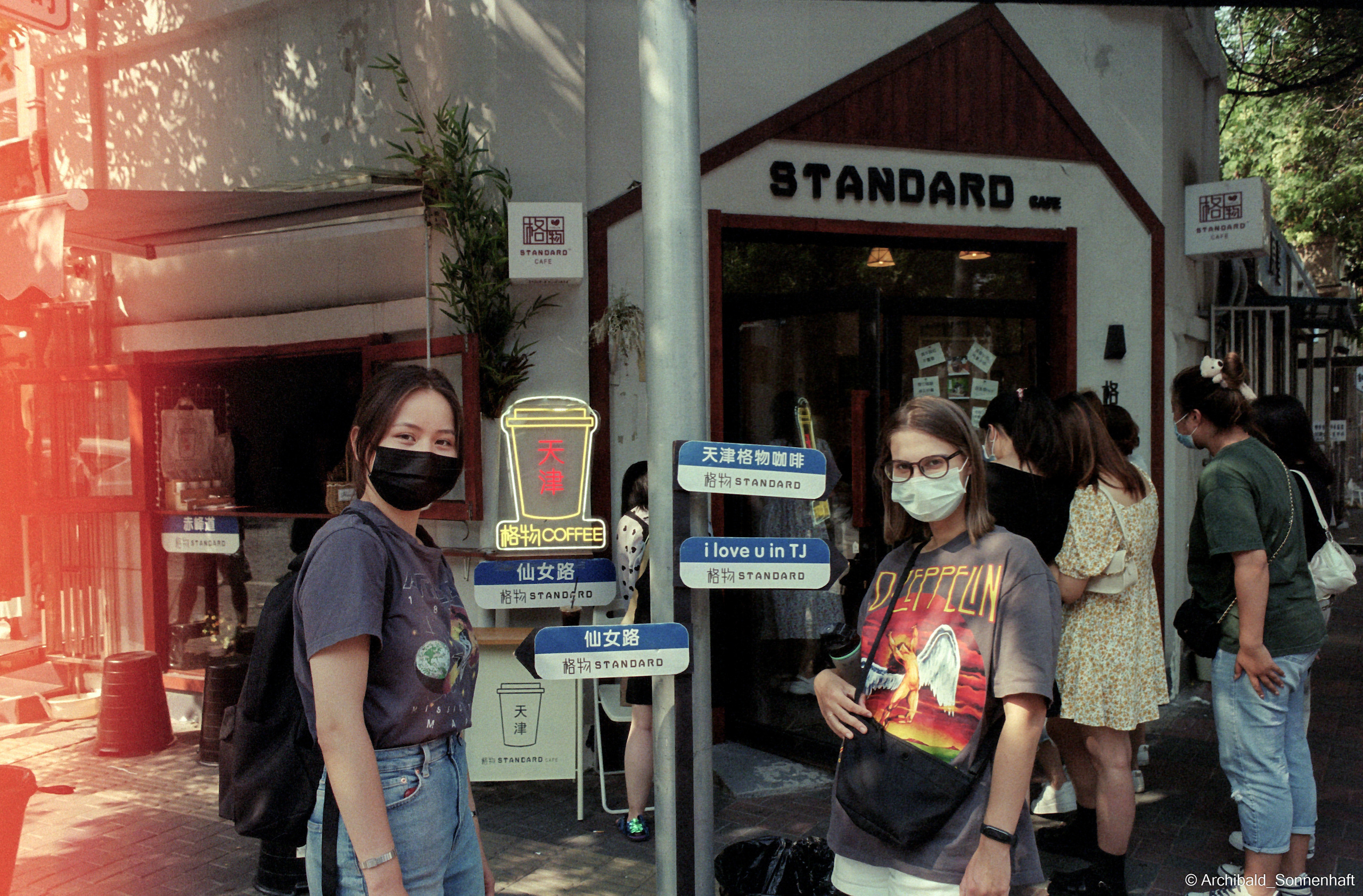 Yep, using film. Photographer in Guangzhou, China. Archibald Sonnenhaft