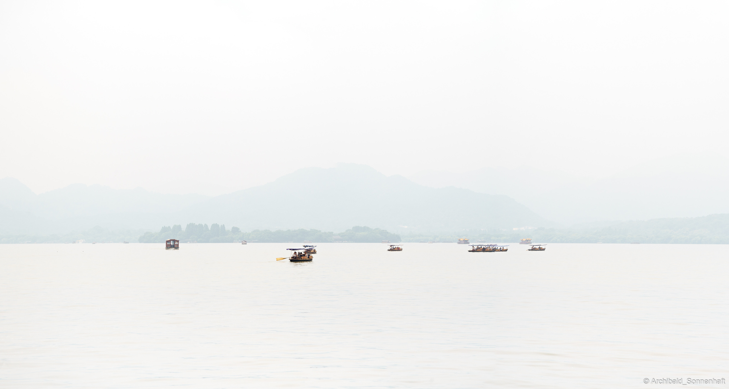 Photographer in Guangzhou, China. Archibald Sonnenhaft