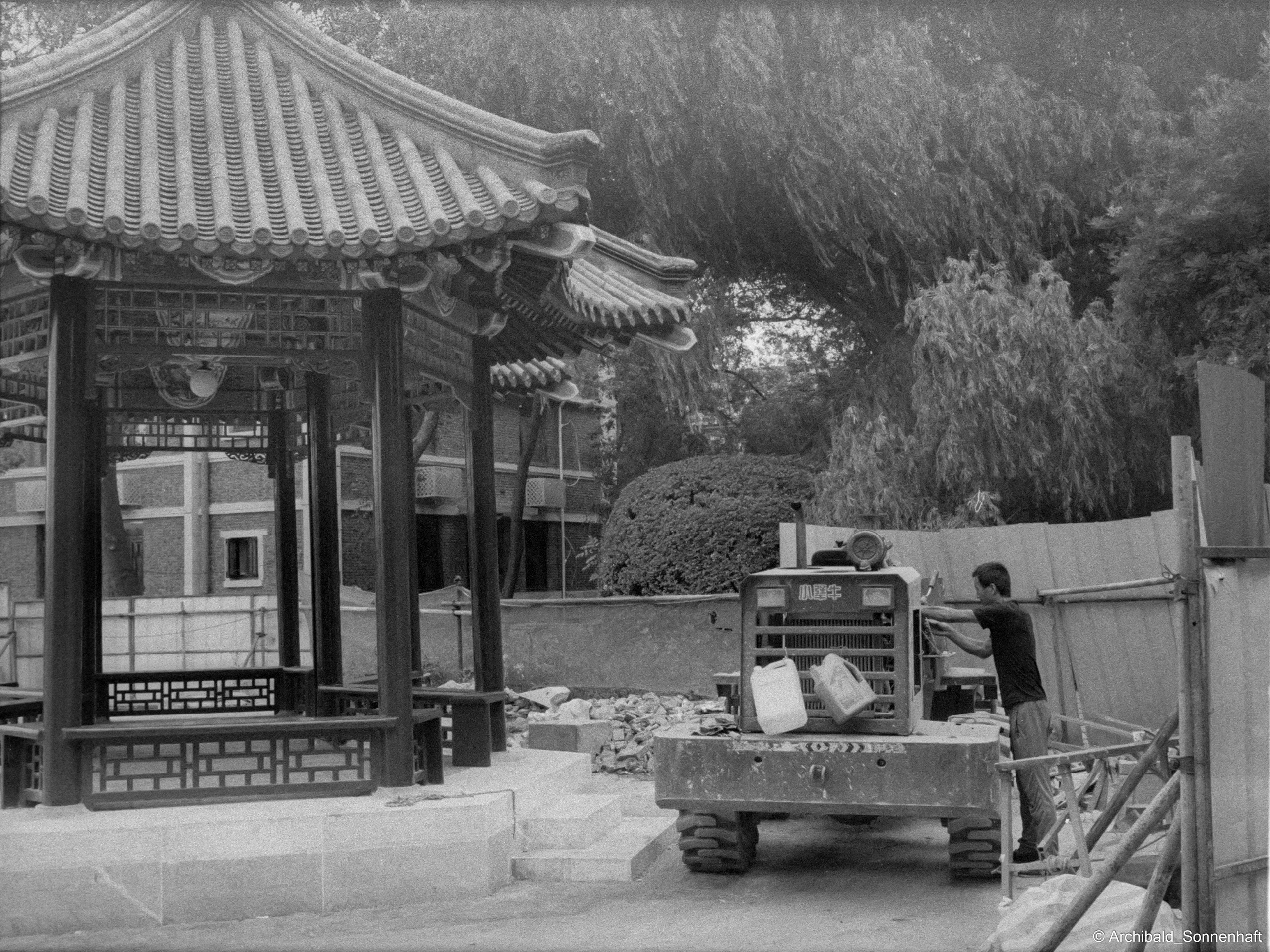 Yep, using film. Photographer in Guangzhou, China. Archibald Sonnenhaft