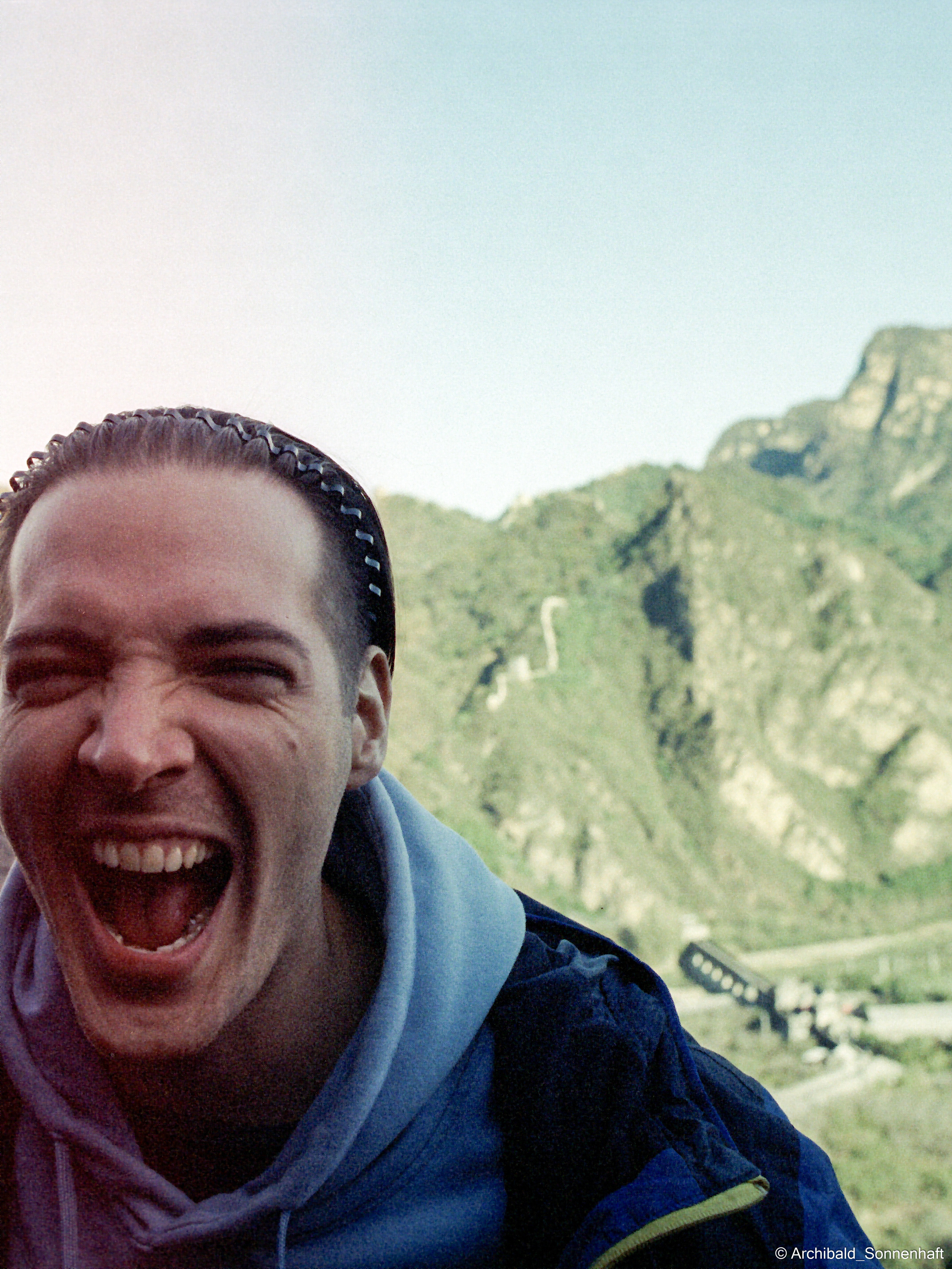 Yep, using film. Photographer in Guangzhou, China. Archibald Sonnenhaft