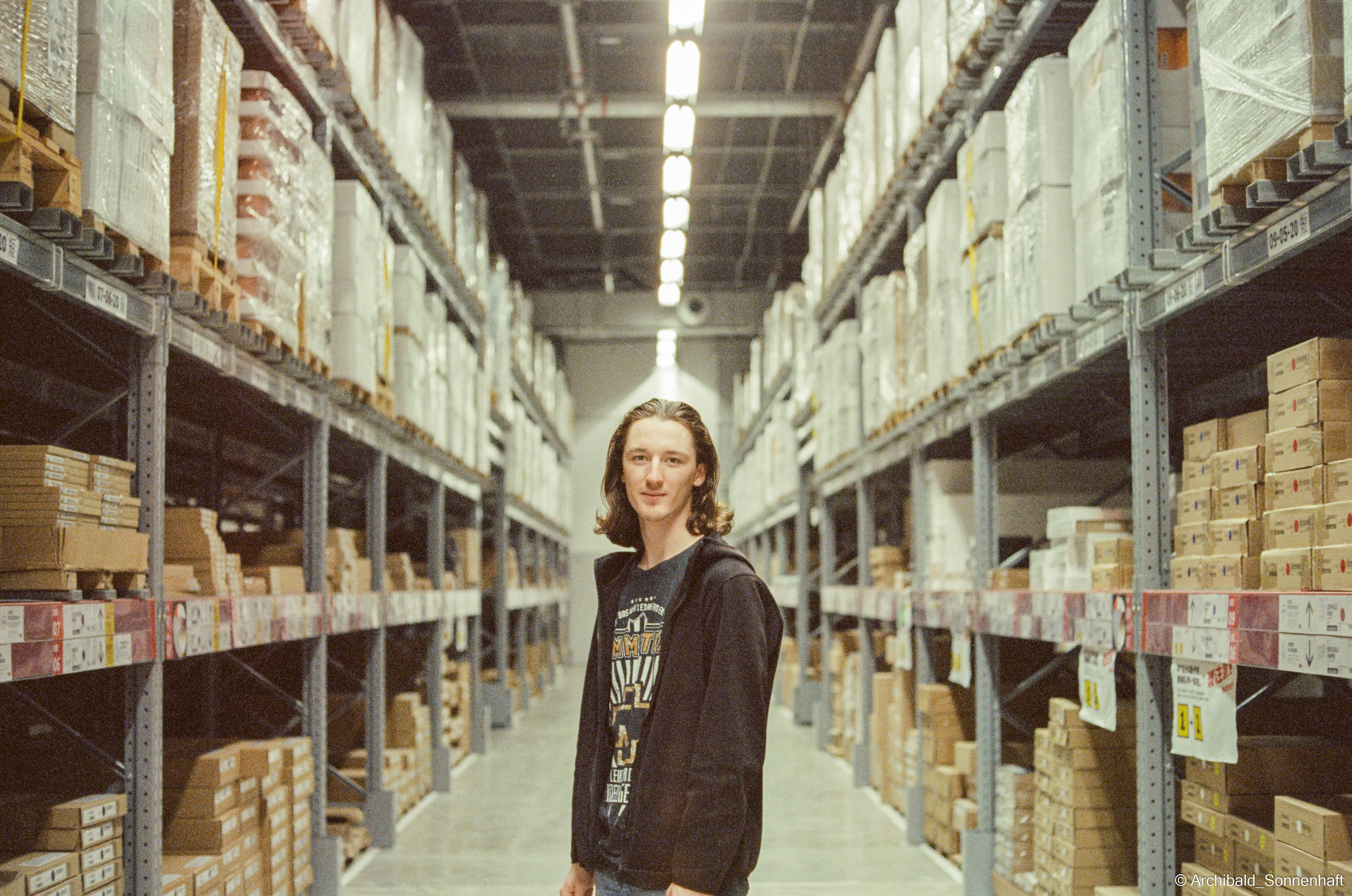 Yep, using film. Photographer in Guangzhou, China. Archibald Sonnenhaft