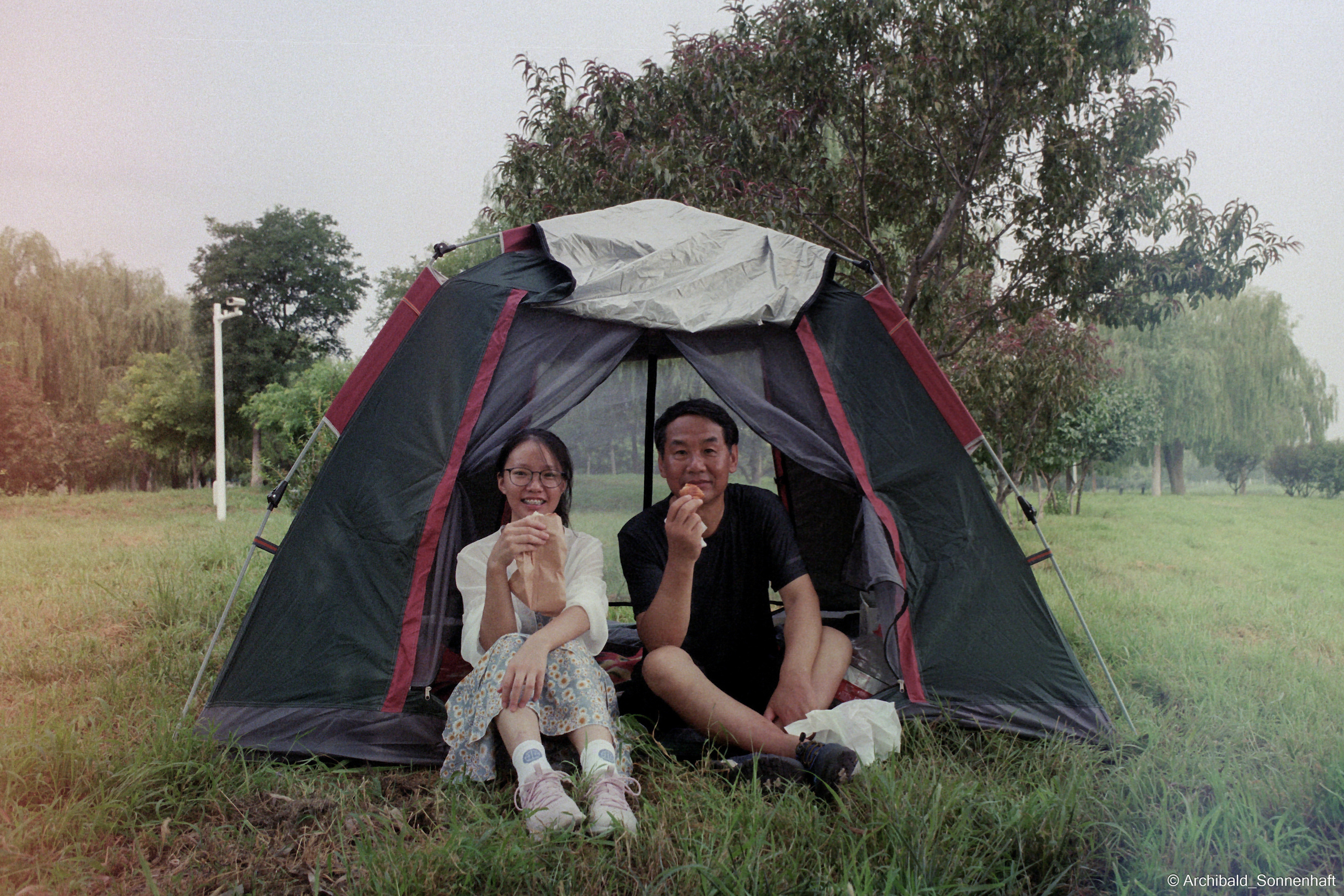 Yep, using film. Photographer in Guangzhou, China. Archibald Sonnenhaft