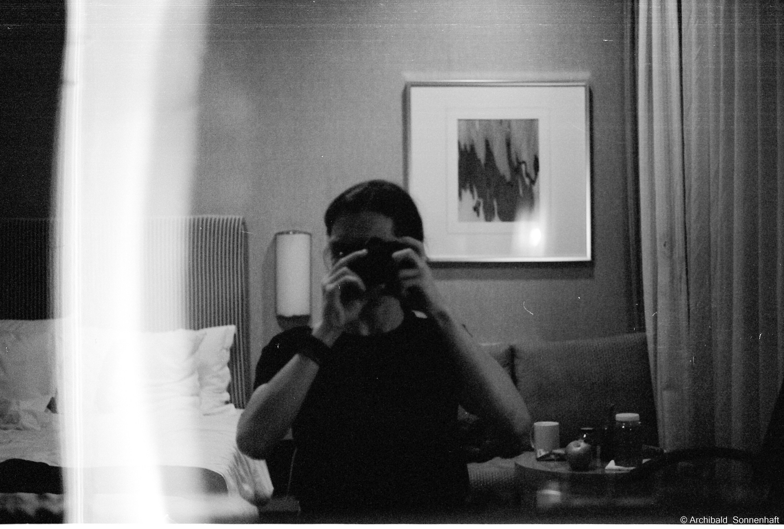 Yep, using film. Photographer in Guangzhou, China. Archibald Sonnenhaft