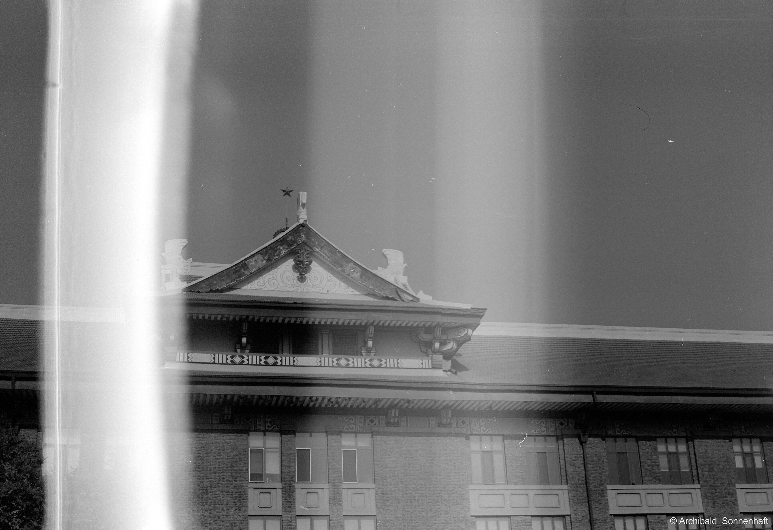 Yep, using film. Photographer in Guangzhou, China. Archibald Sonnenhaft