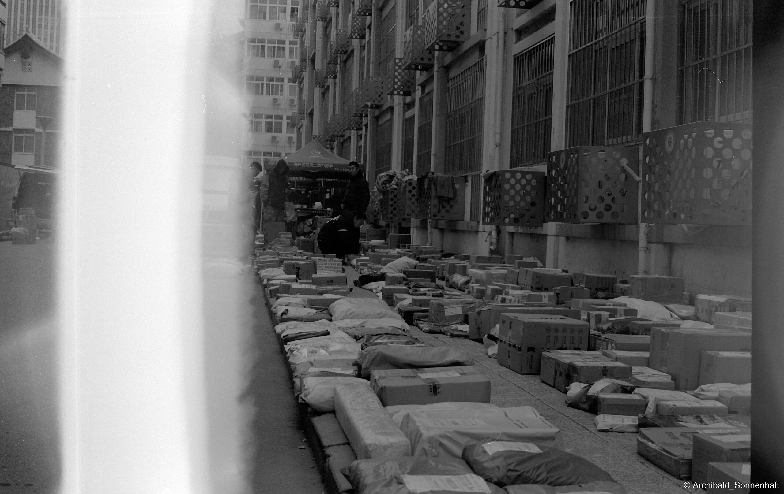 Yep, using film. Photographer in Guangzhou, China. Archibald Sonnenhaft