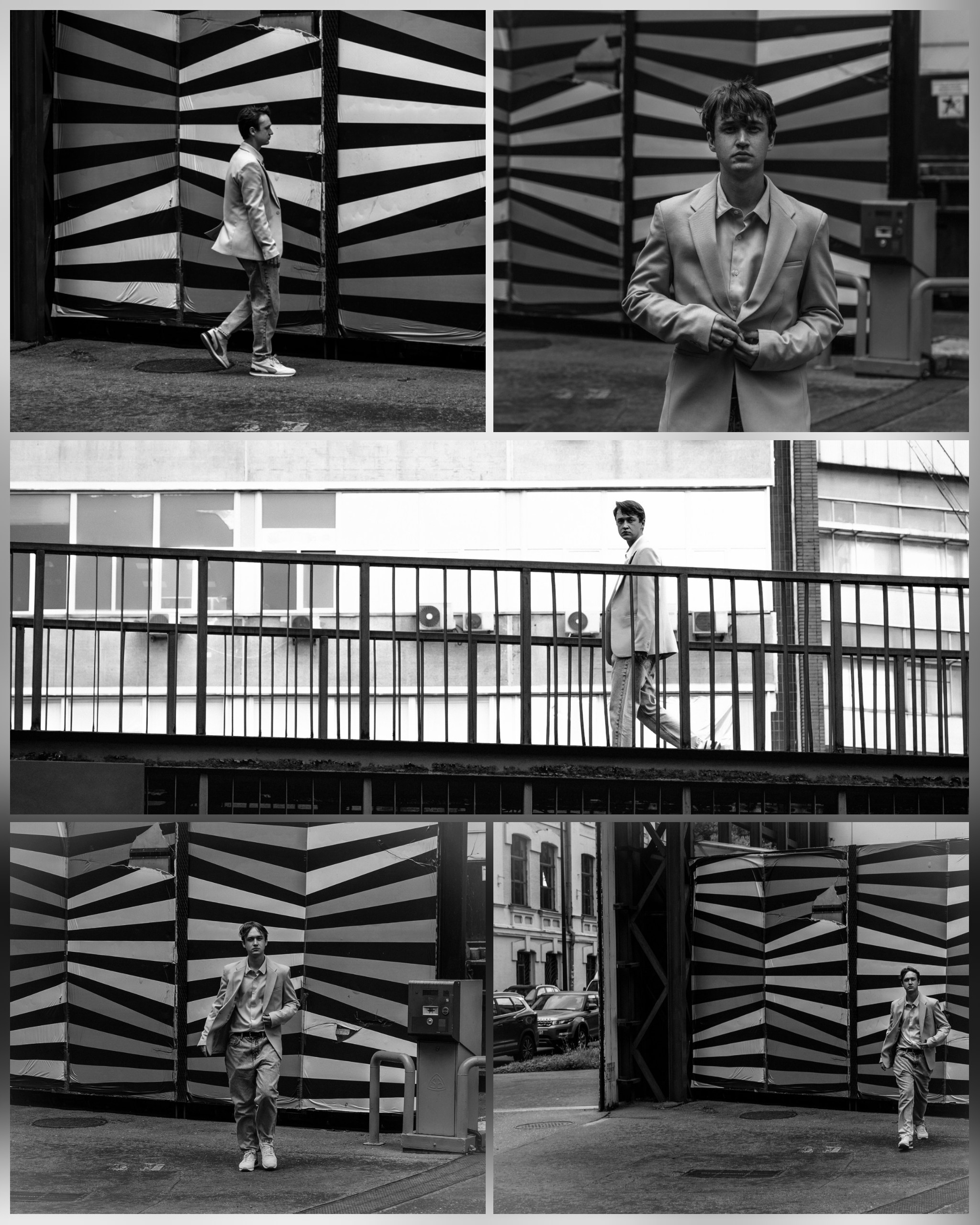 парнеь на фоне полосатого забора