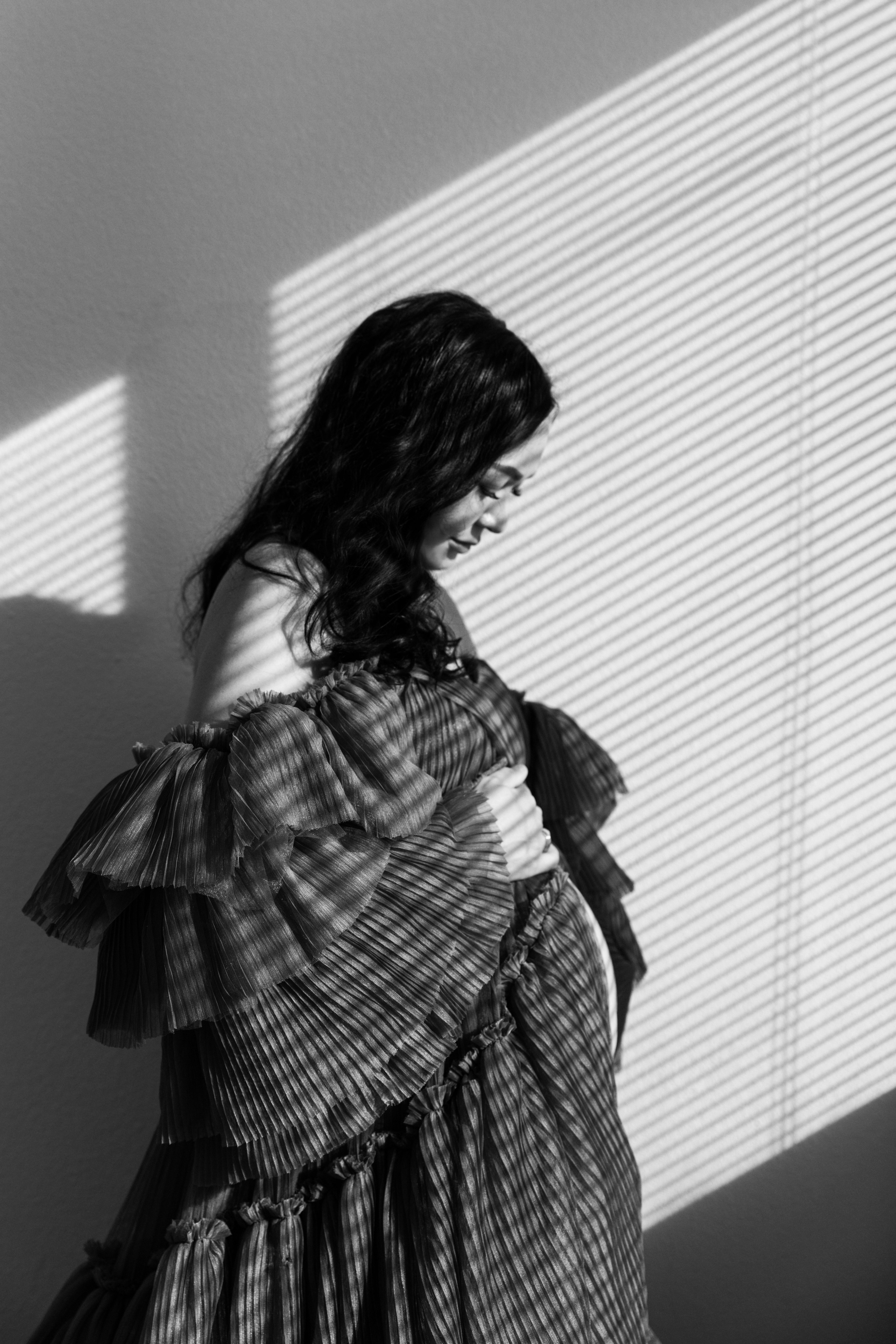 Pregnancy photo session with husband in studio