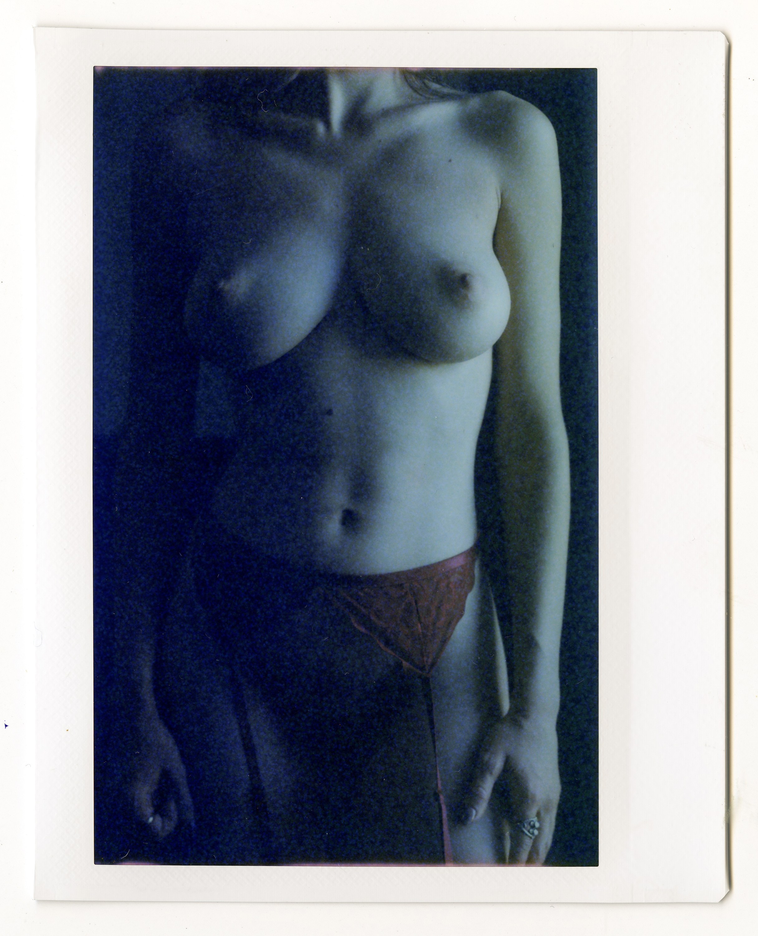 Erotic photography on Instax Wide. Art nude film photographer Roman Silentium
