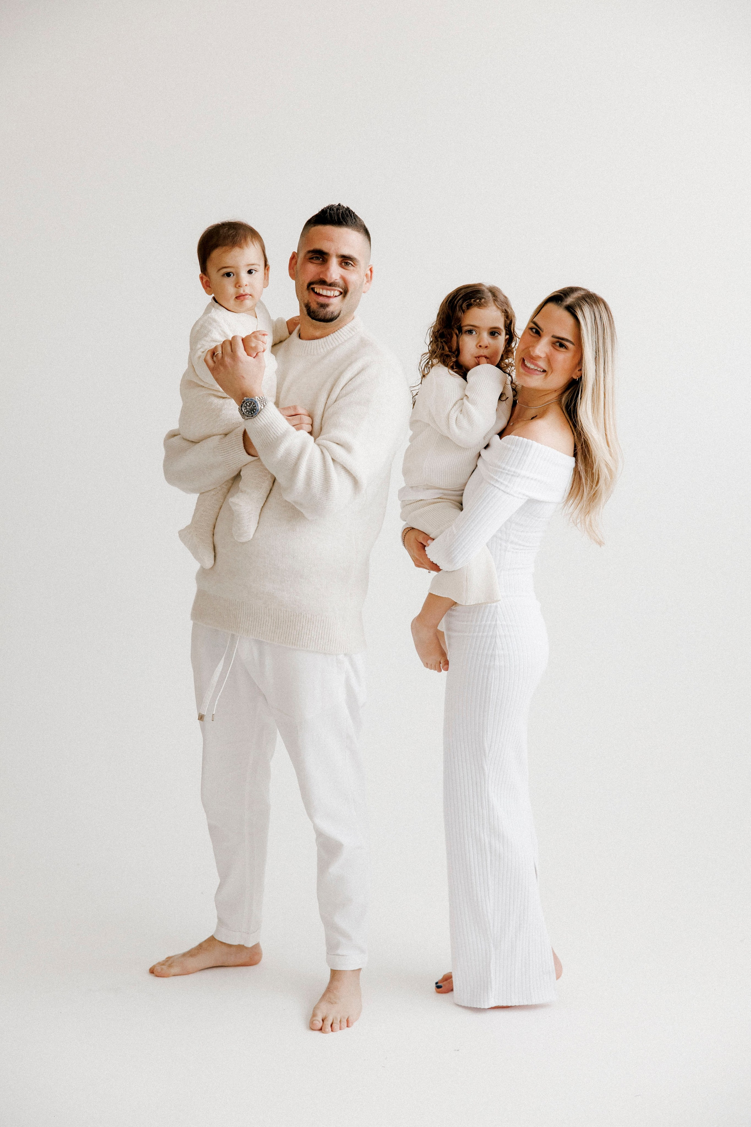 Family photoshoot in White Studio. Wedding and family photographer