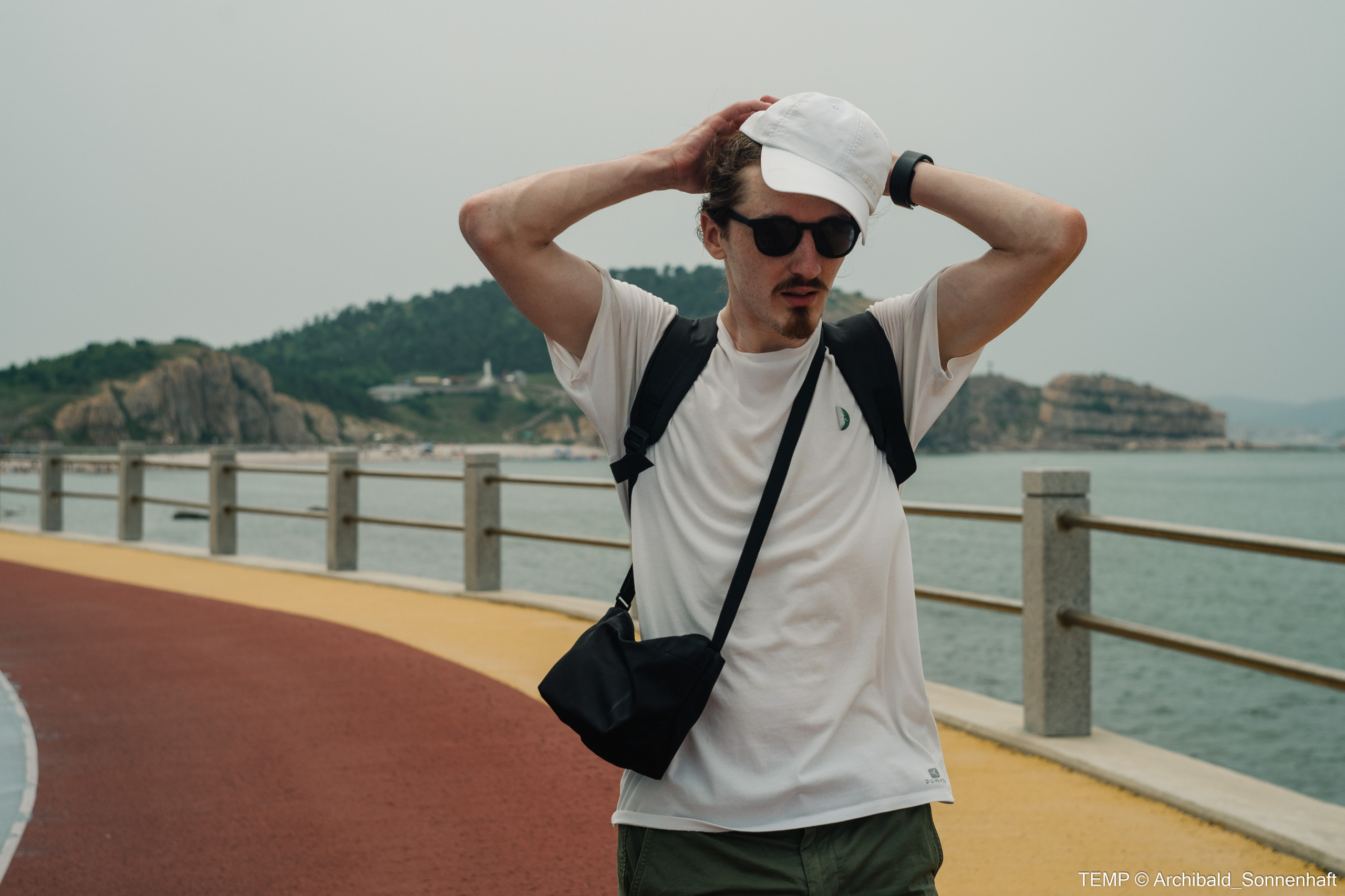 Small tourist island (Yantai district, China). Photographer in Guangzhou, China. Archibald Sonnenhaft