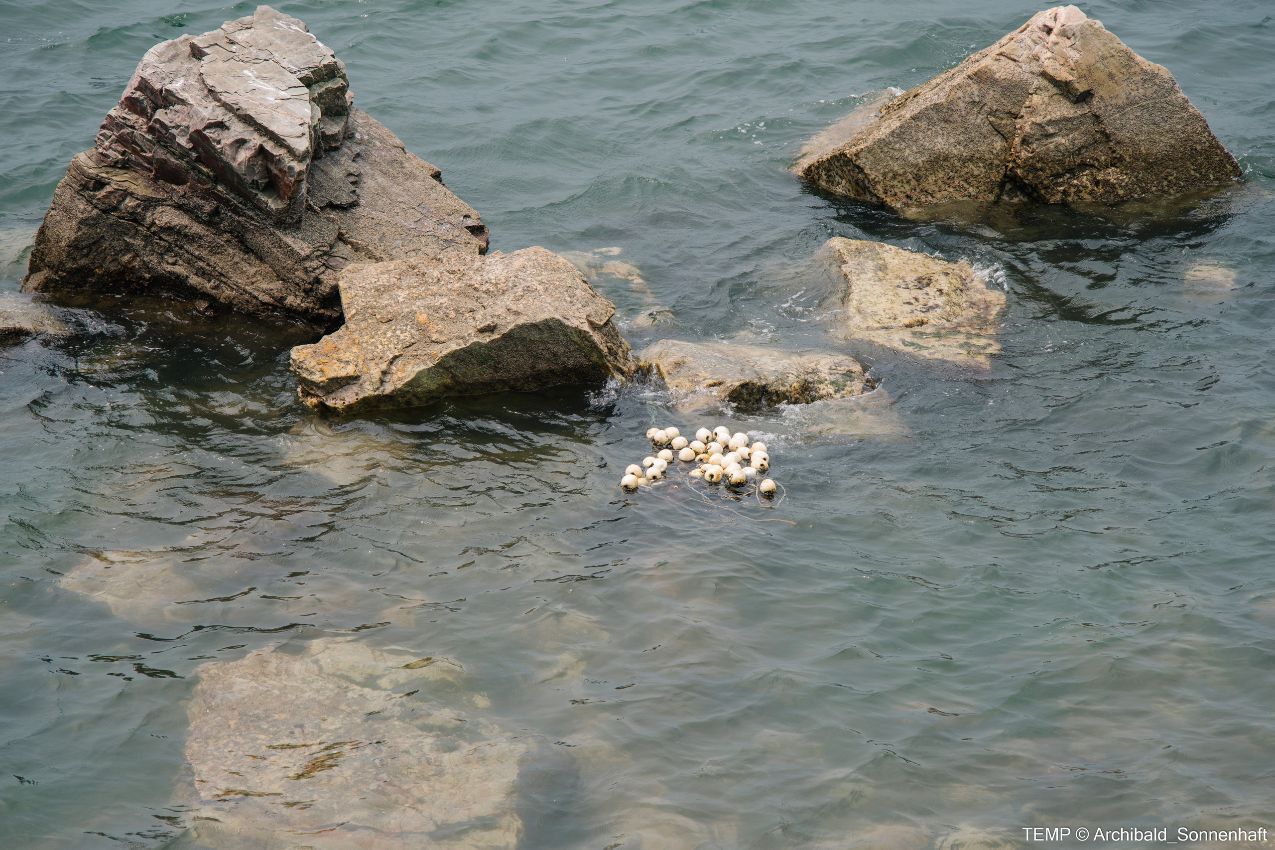 Small tourist island (Yantai district, China). Photographer in Guangzhou, China. Archibald Sonnenhaft