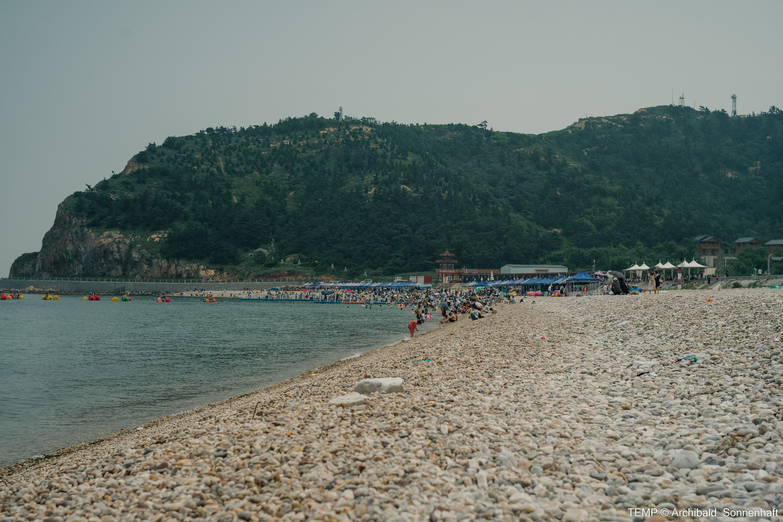 Small tourist island (Yantai district, China). Photographer in Guangzhou, China. Archibald Sonnenhaft