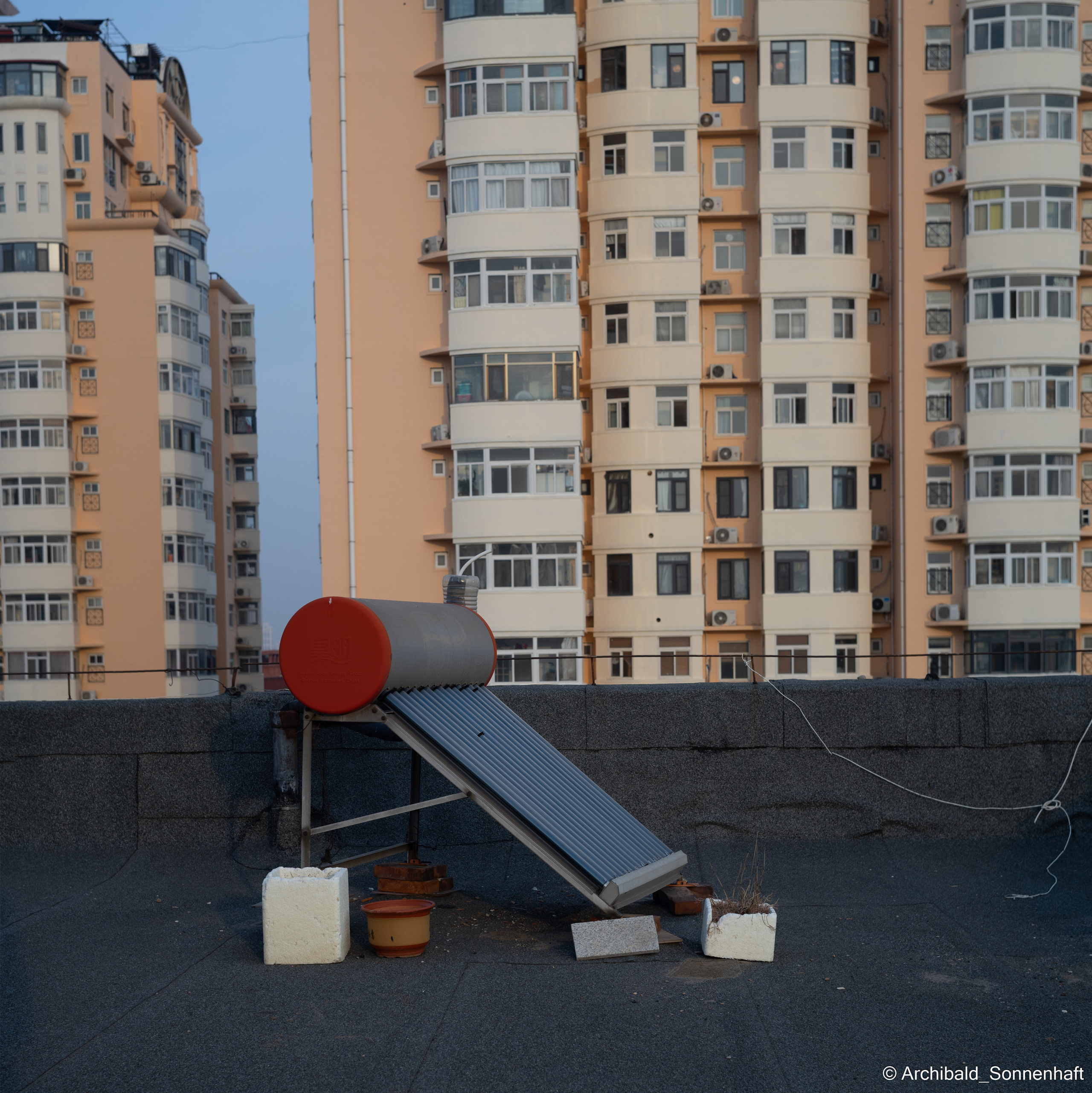 On the roof. Photographer in Guangzhou, China. Archibald Sonnenhaft
