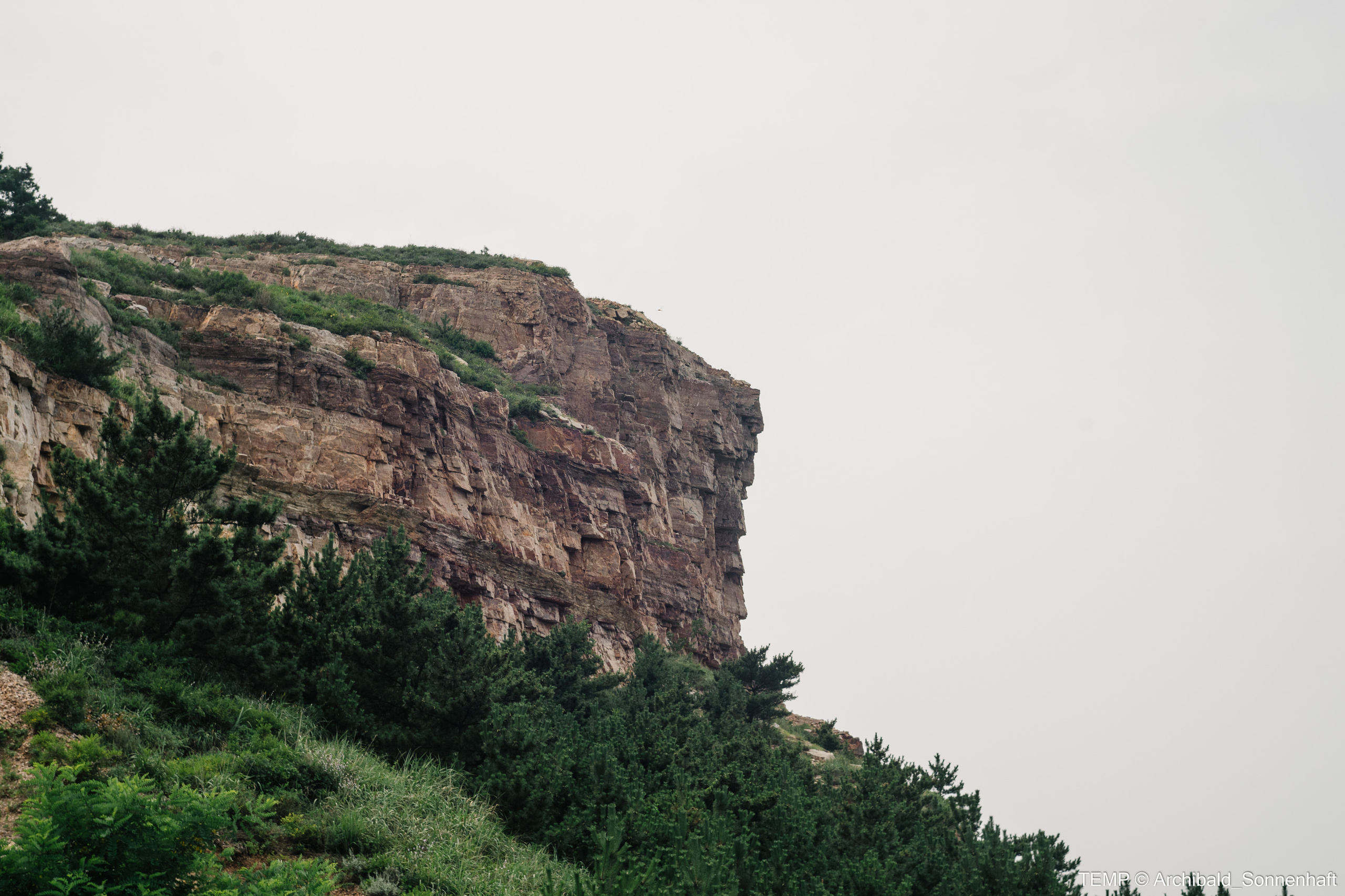 Small tourist island (Yantai district, China). Photographer in Guangzhou, China. Archibald Sonnenhaft