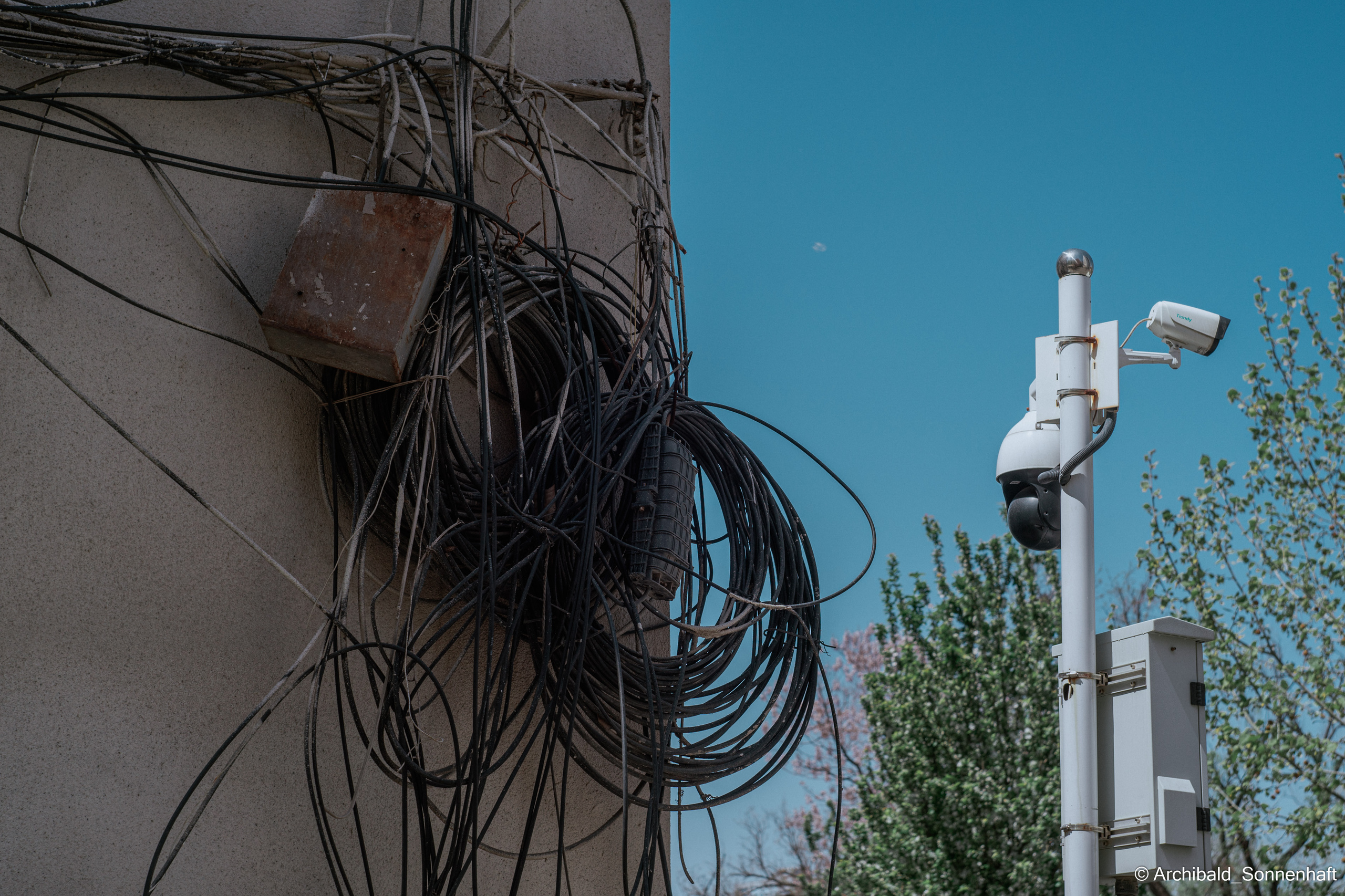 Wires. Photographer in Guangzhou, China. Archibald Sonnenhaft