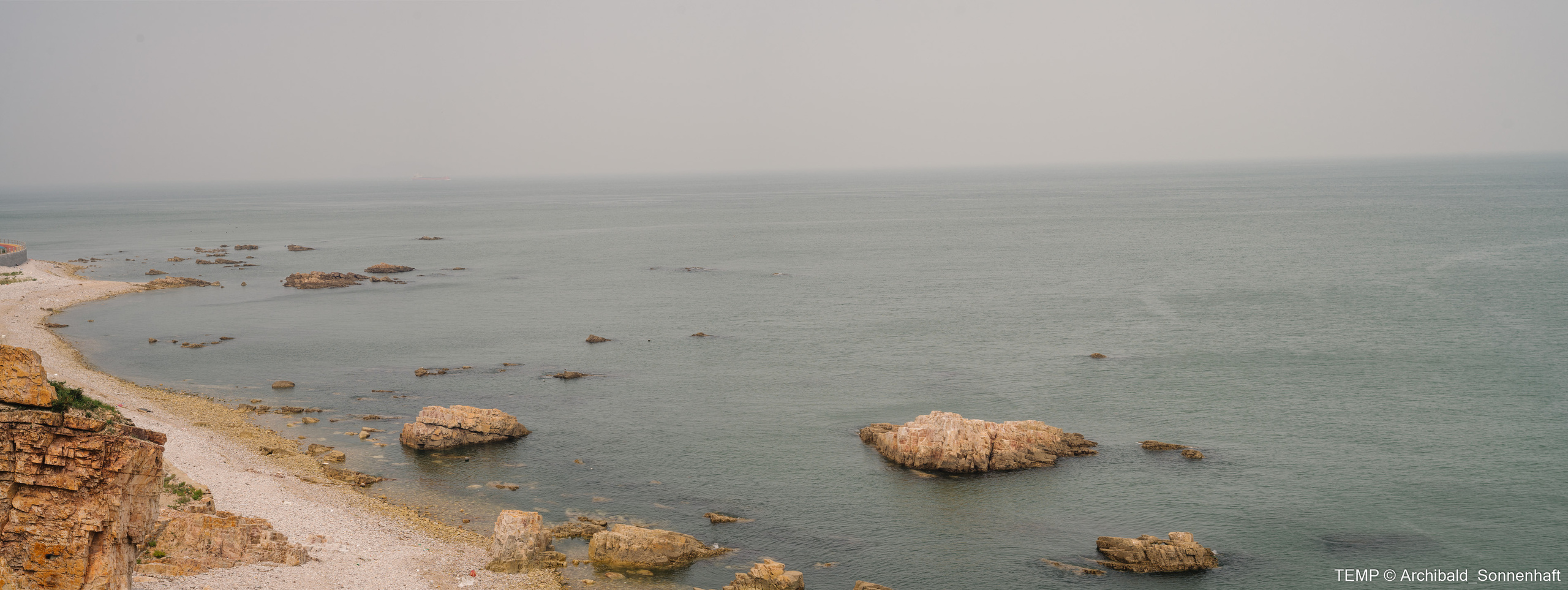 Small tourist island (Yantai district, China). Photographer in Guangzhou, China. Archibald Sonnenhaft