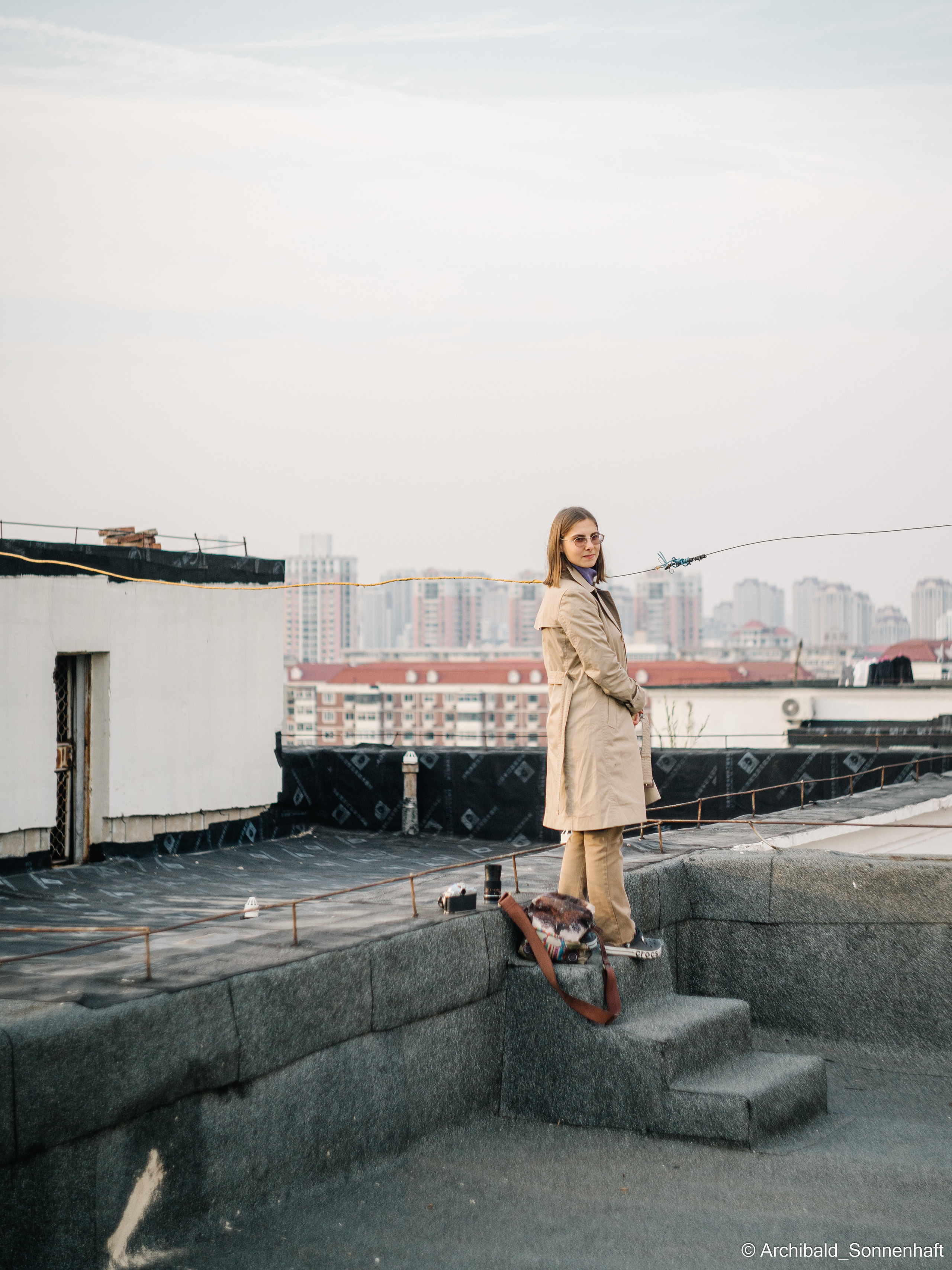 On the roof. Photographer in Guangzhou, China. Archibald Sonnenhaft