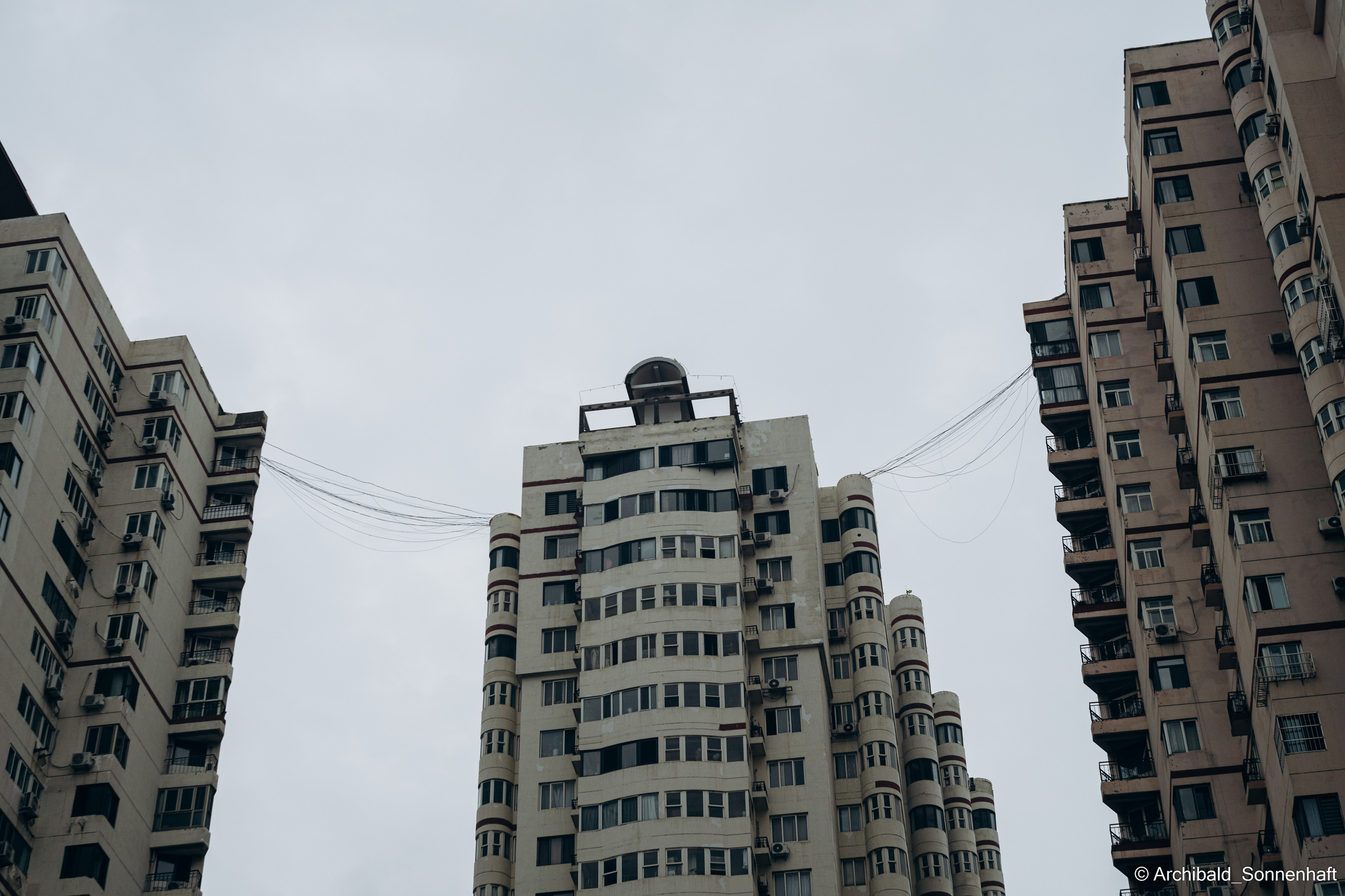 Wires. Photographer in Guangzhou, China. Archibald Sonnenhaft