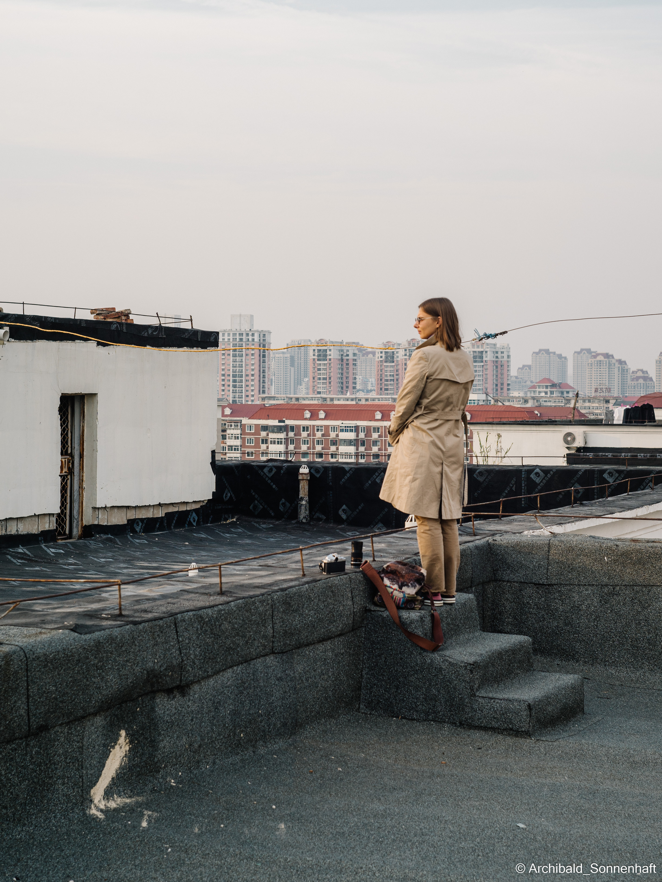 On the roof. Photographer in Guangzhou, China. Archibald Sonnenhaft