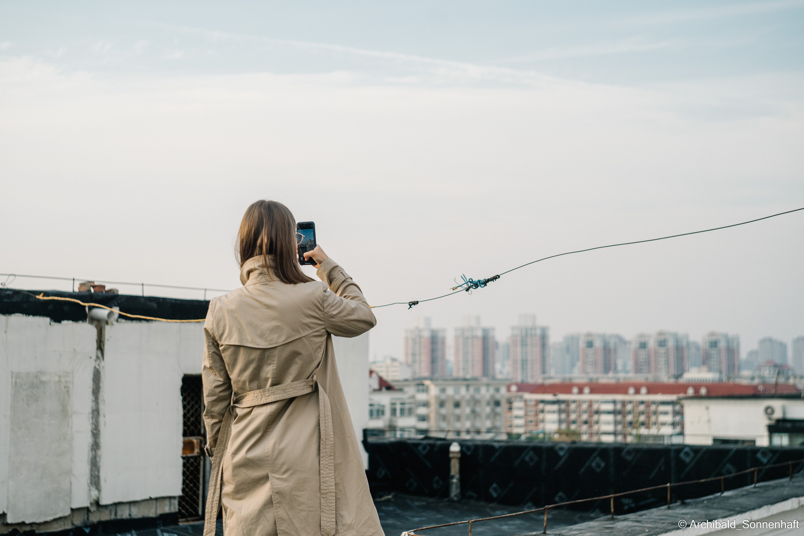On the roof. Photographer in Guangzhou, China. Archibald Sonnenhaft