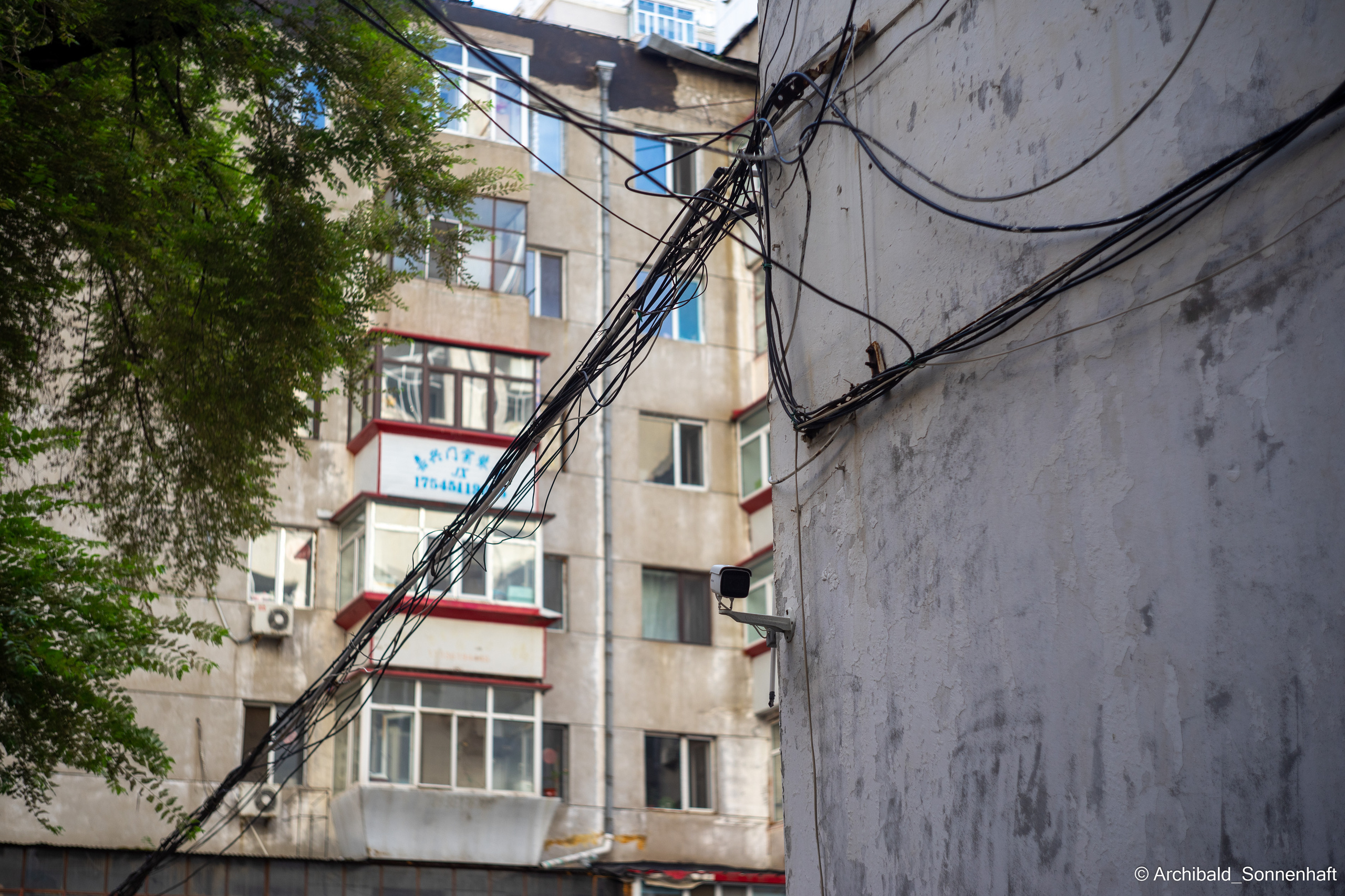 Wires. Photographer in Guangzhou, China. Archibald Sonnenhaft