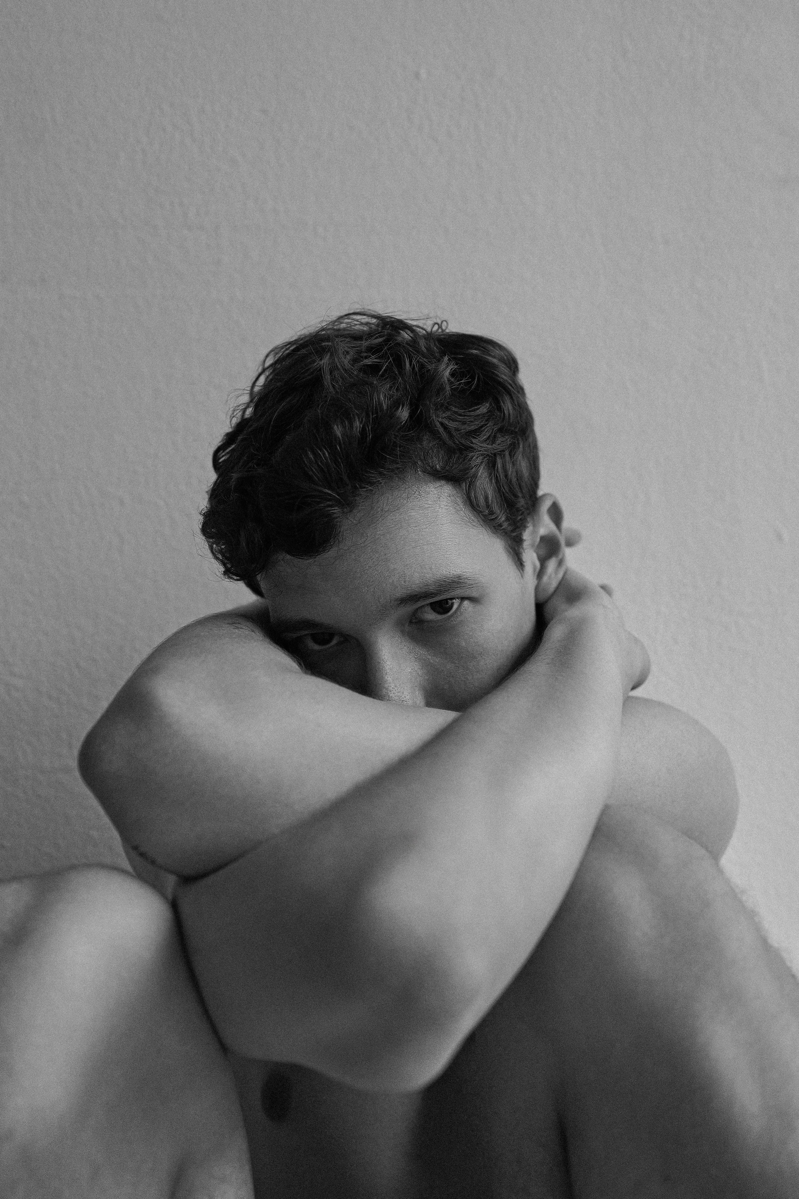 Intimate Barcelona portrait in black and white with dramatic facial expression