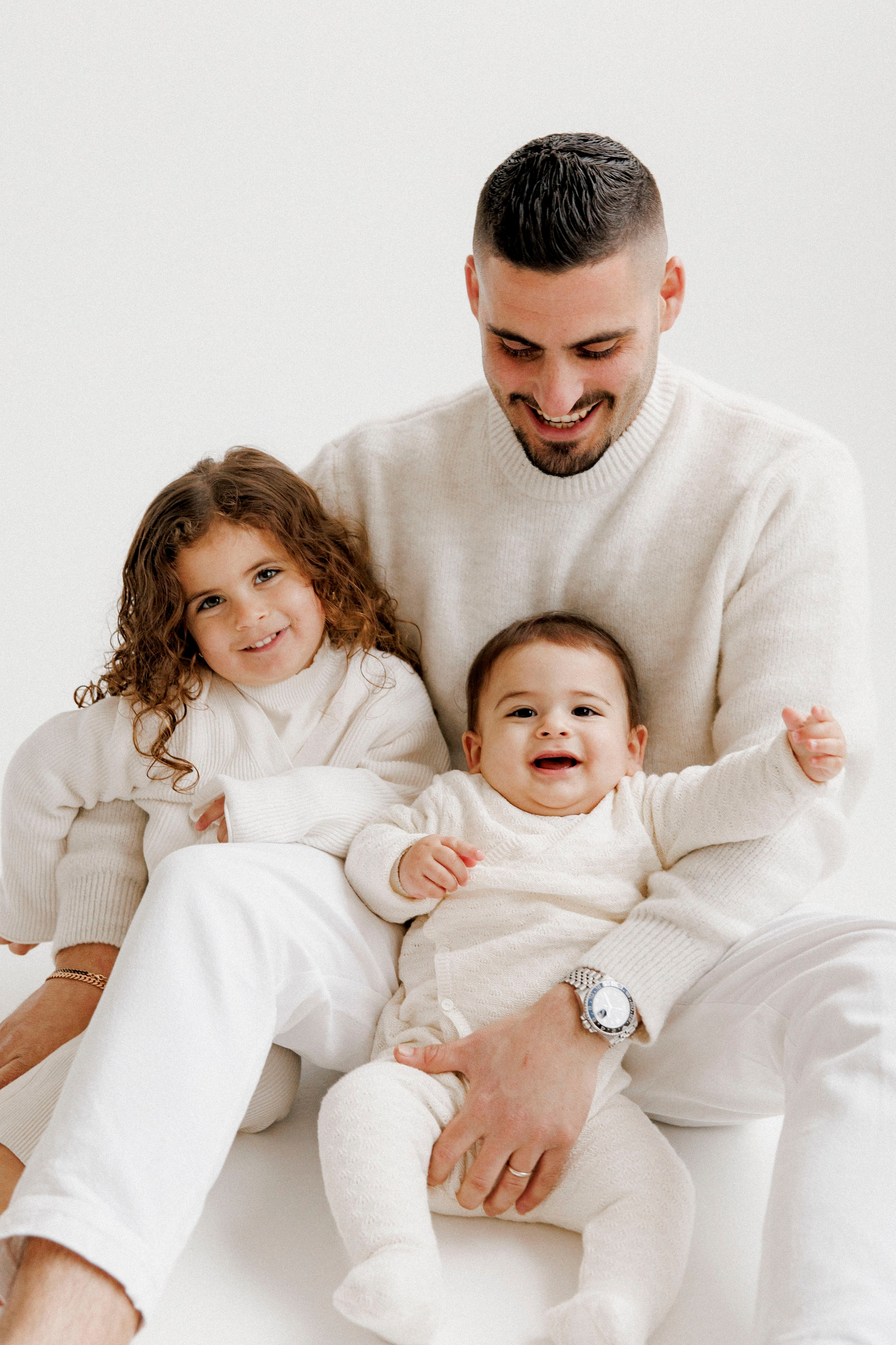 Family photoshoot in White Studio. Wedding and family photographer