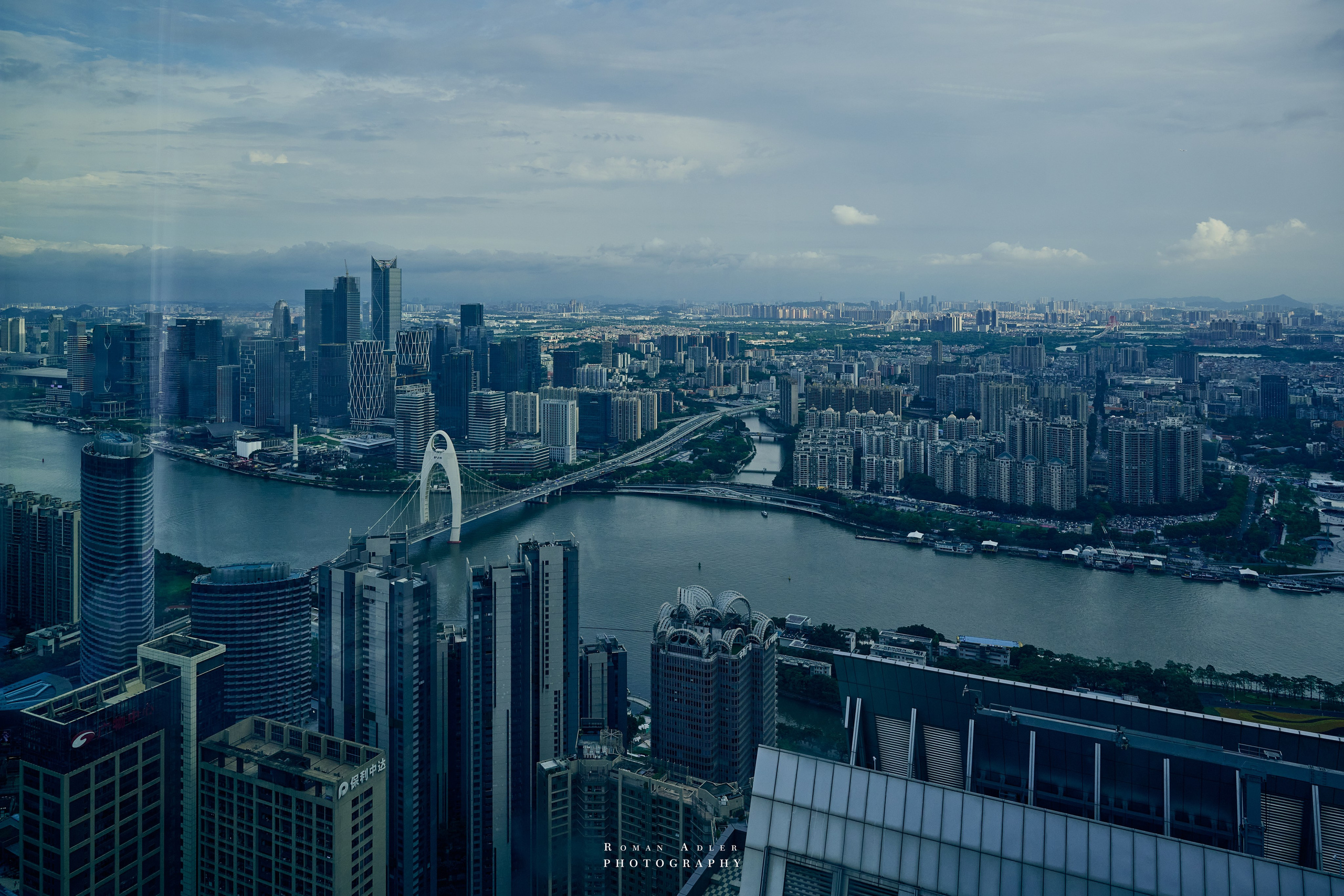 Гуанчжоу — «Город цветов». 摄影师罗曼·阿德勒