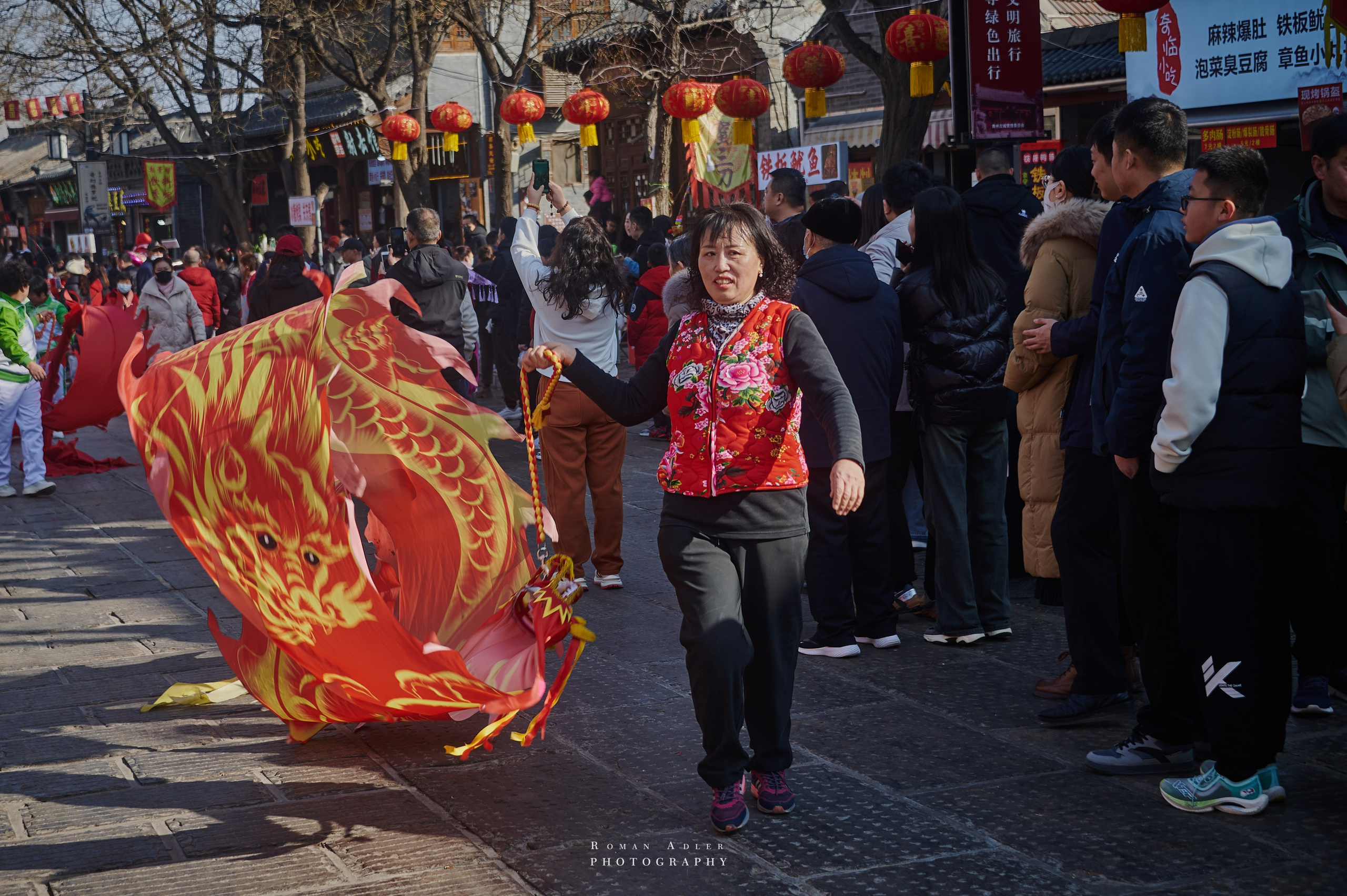 Новогодний парад в Цинчжоу. Китай. Фотограф Роман Адлер