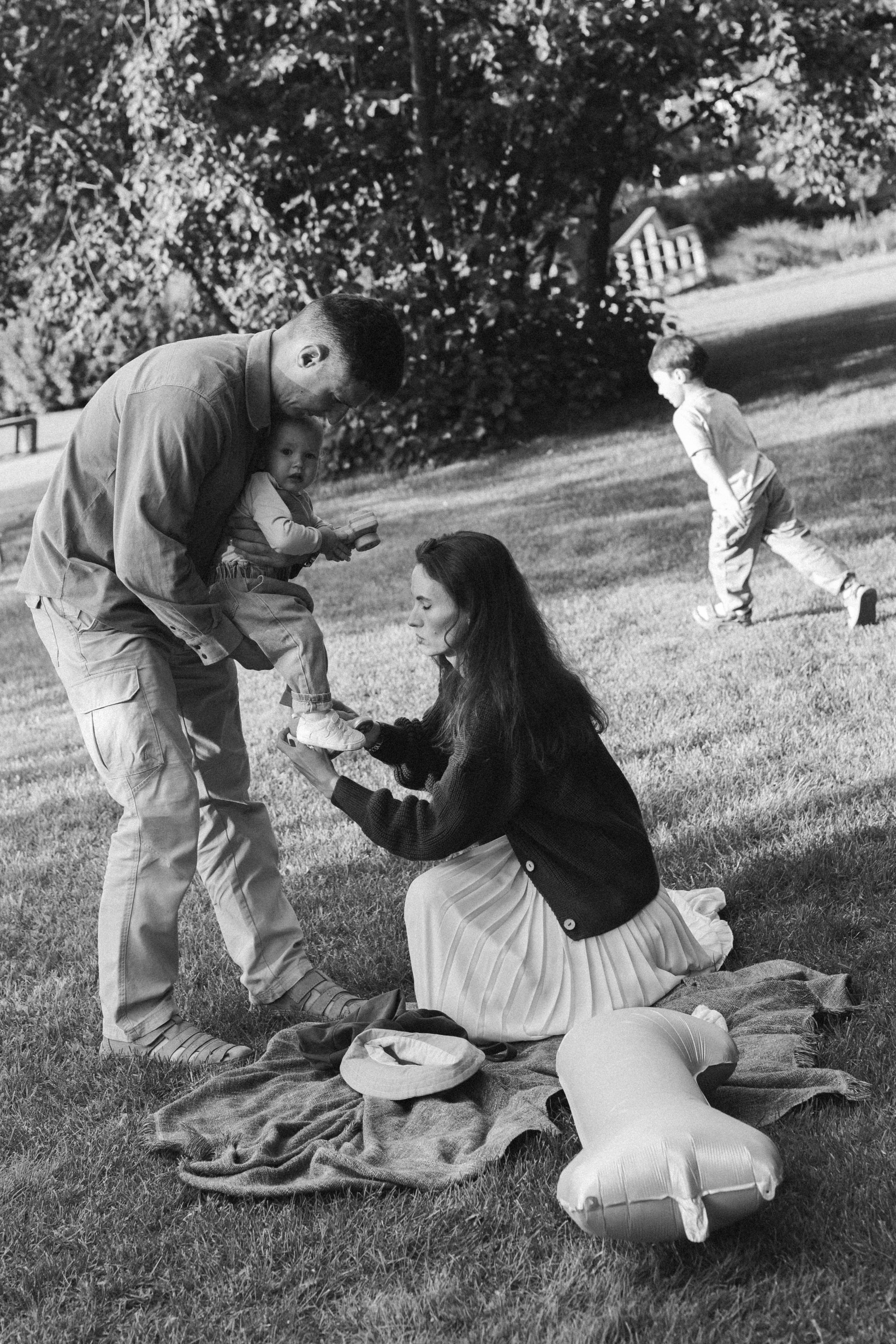 Семья в парке. Фотография о важном