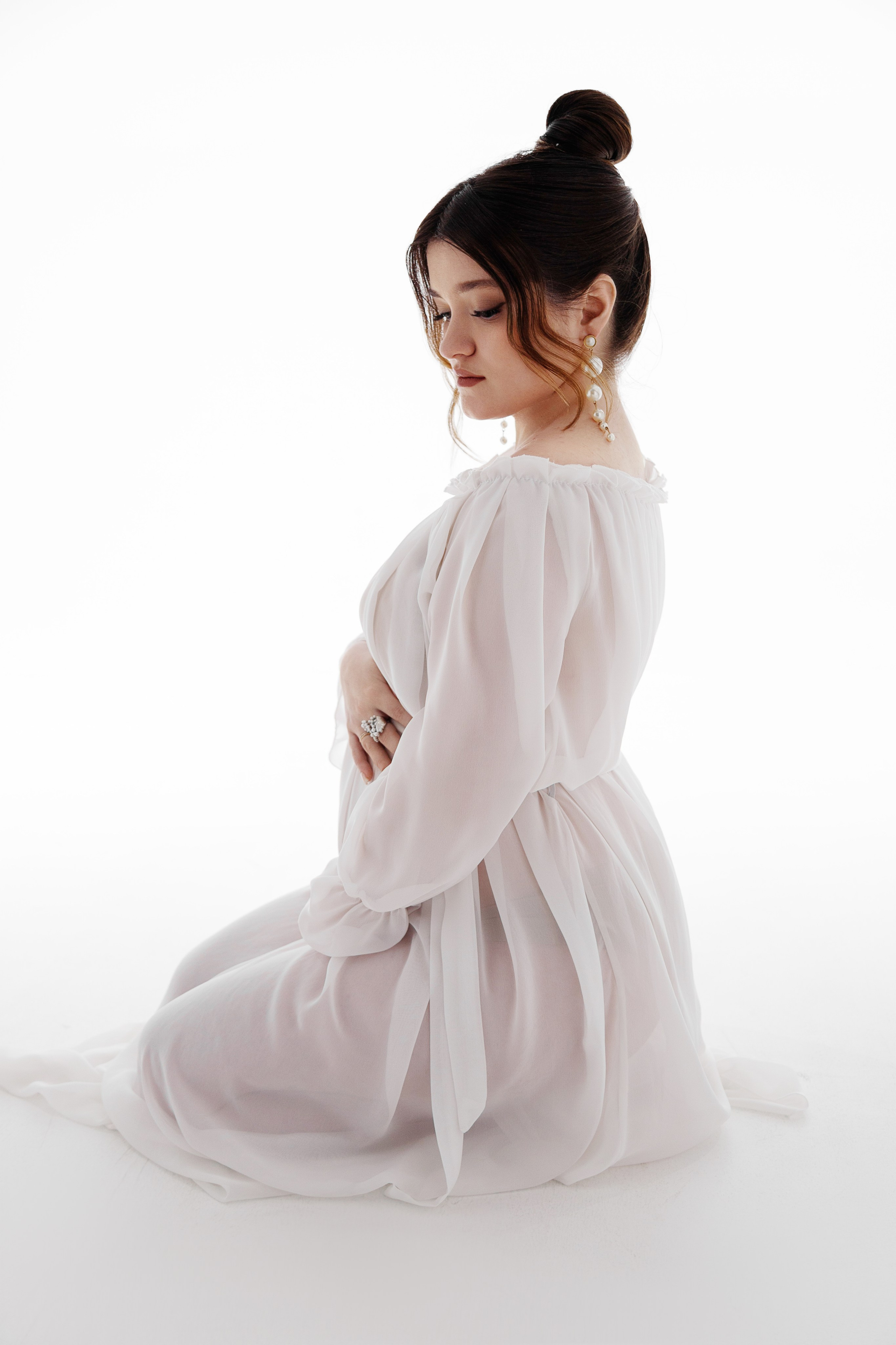 Девять месяцев до встречи с малышом, красивая фотосессия беременности. Фотограф Ольга Баранова