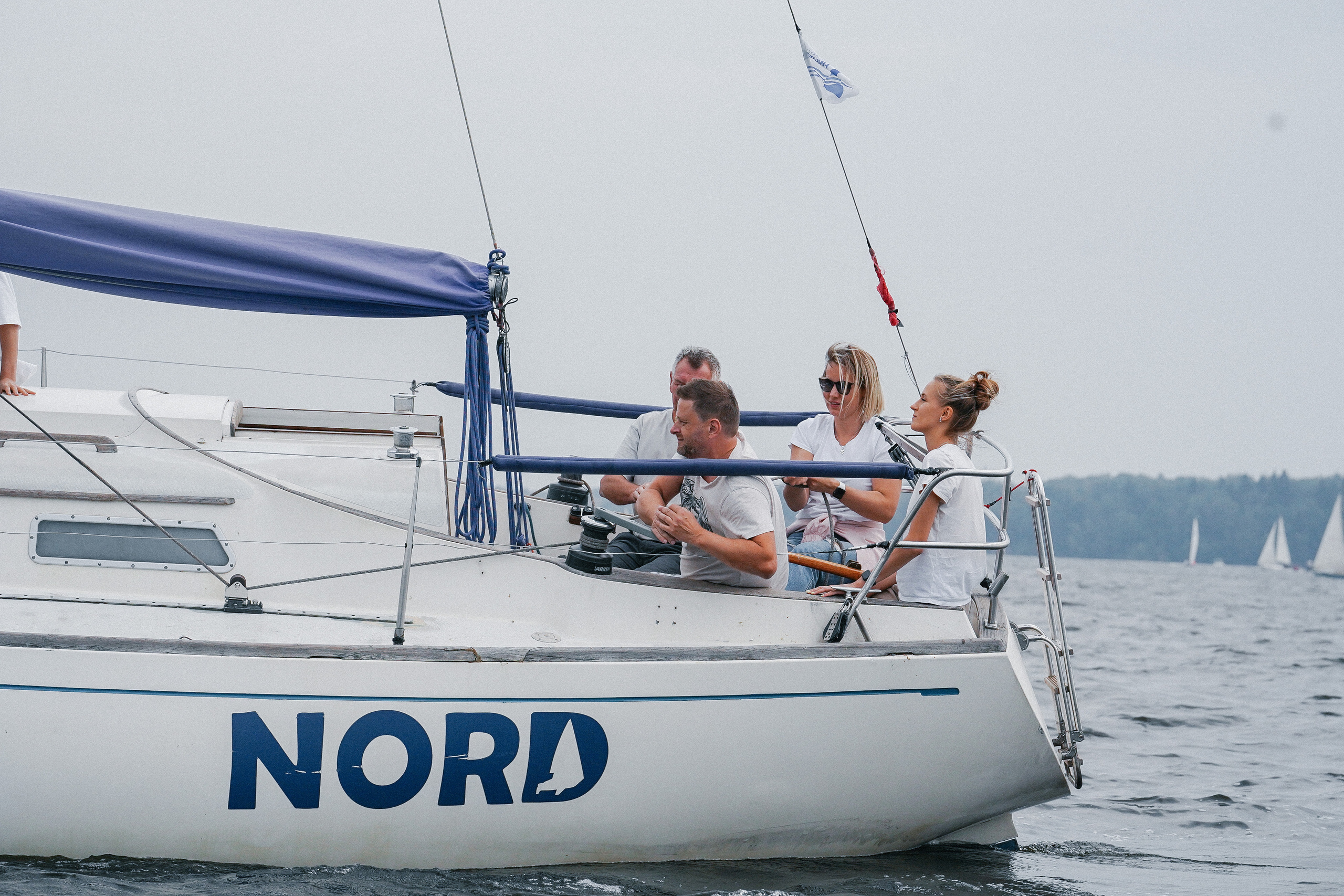 Фотограф на регату на Пироговском водохранилище