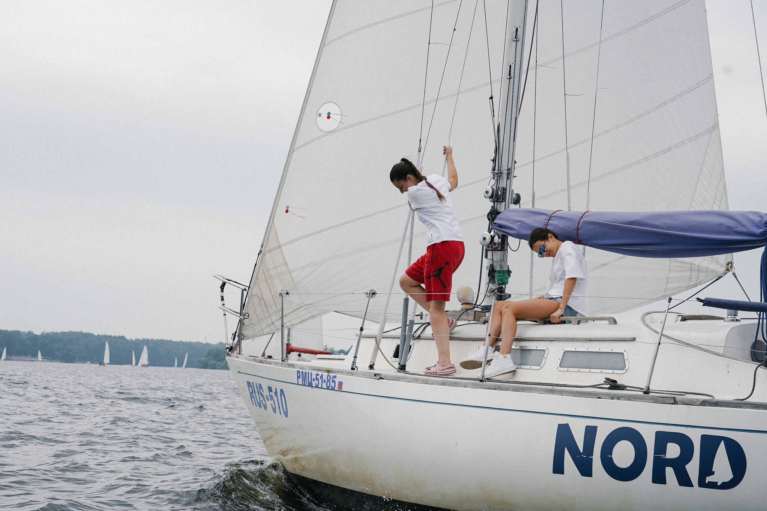 Фотограф на регату на Пироговском водохранилище