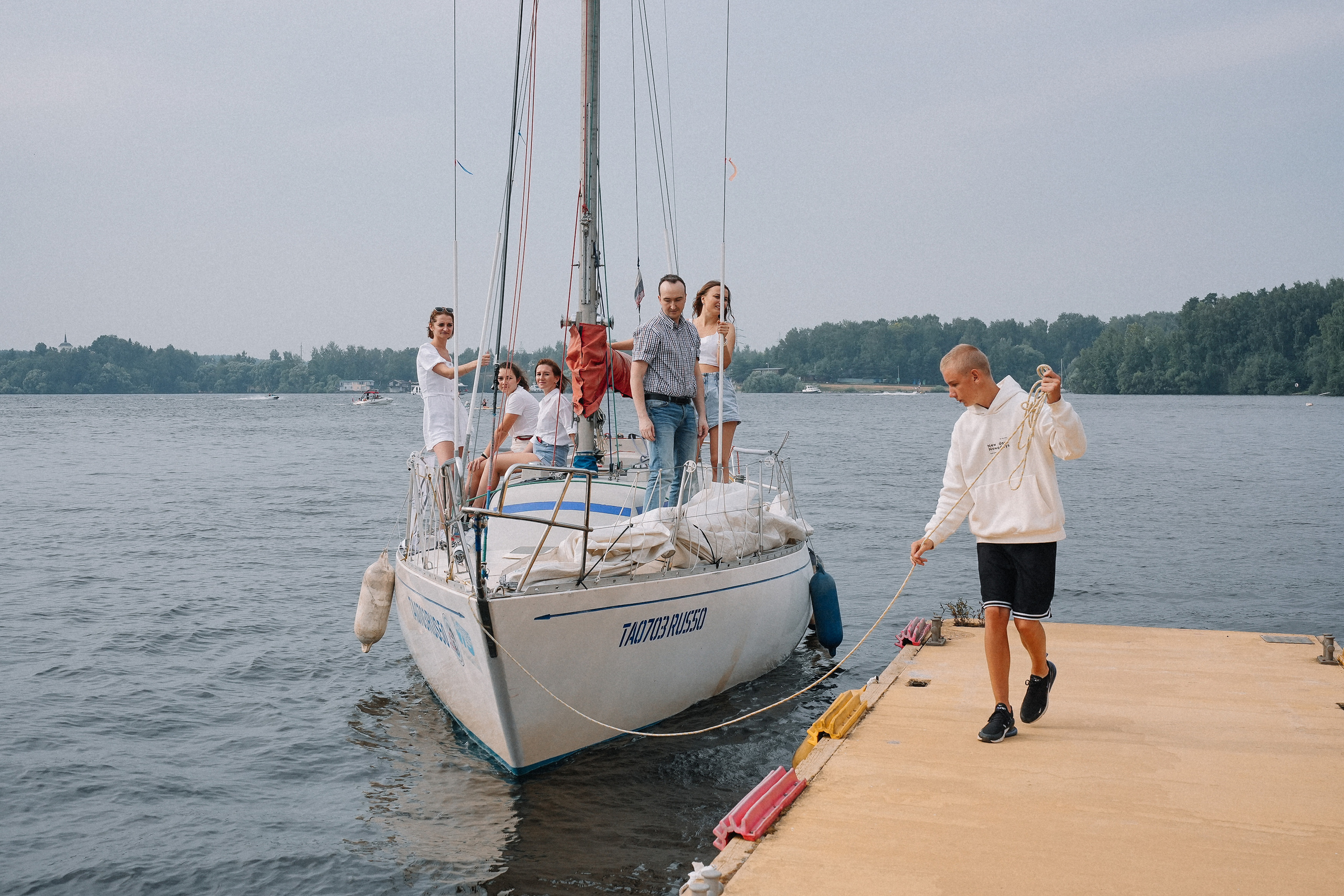 Фотограф на регату на Пироговском водохранилище