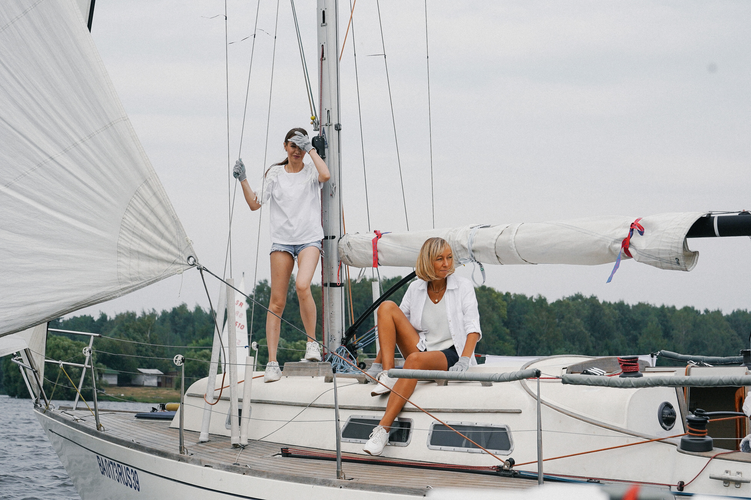 Фотограф на регату на Пироговском водохранилище