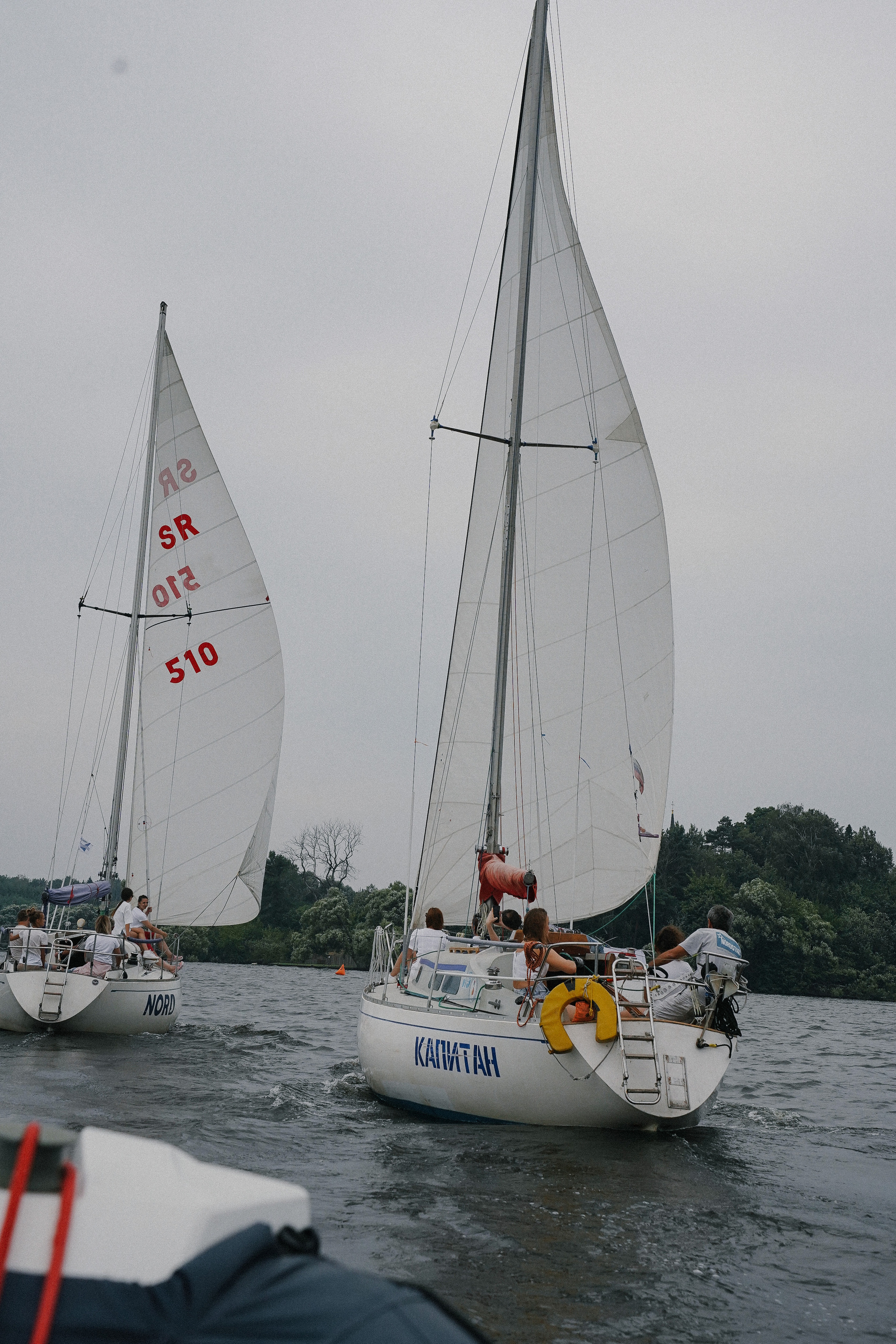 Фотограф на регату на Пироговском водохранилище