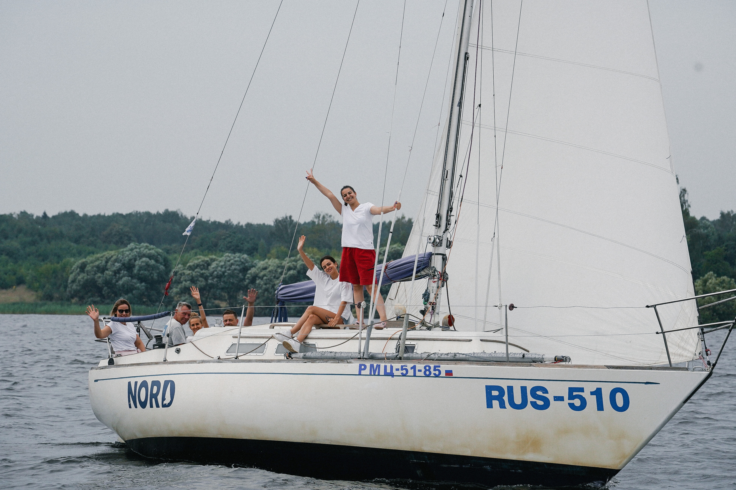 Фотограф на регату на Пироговском водохранилище