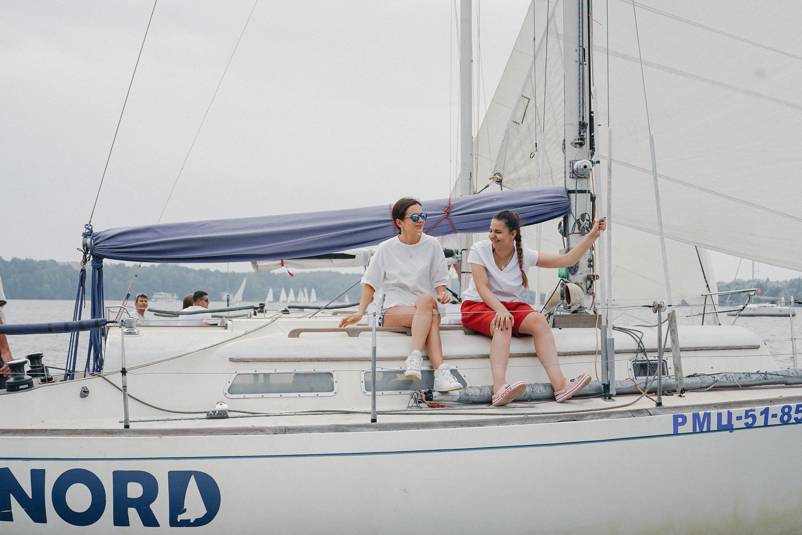 Фотограф на регату на Пироговском водохранилище