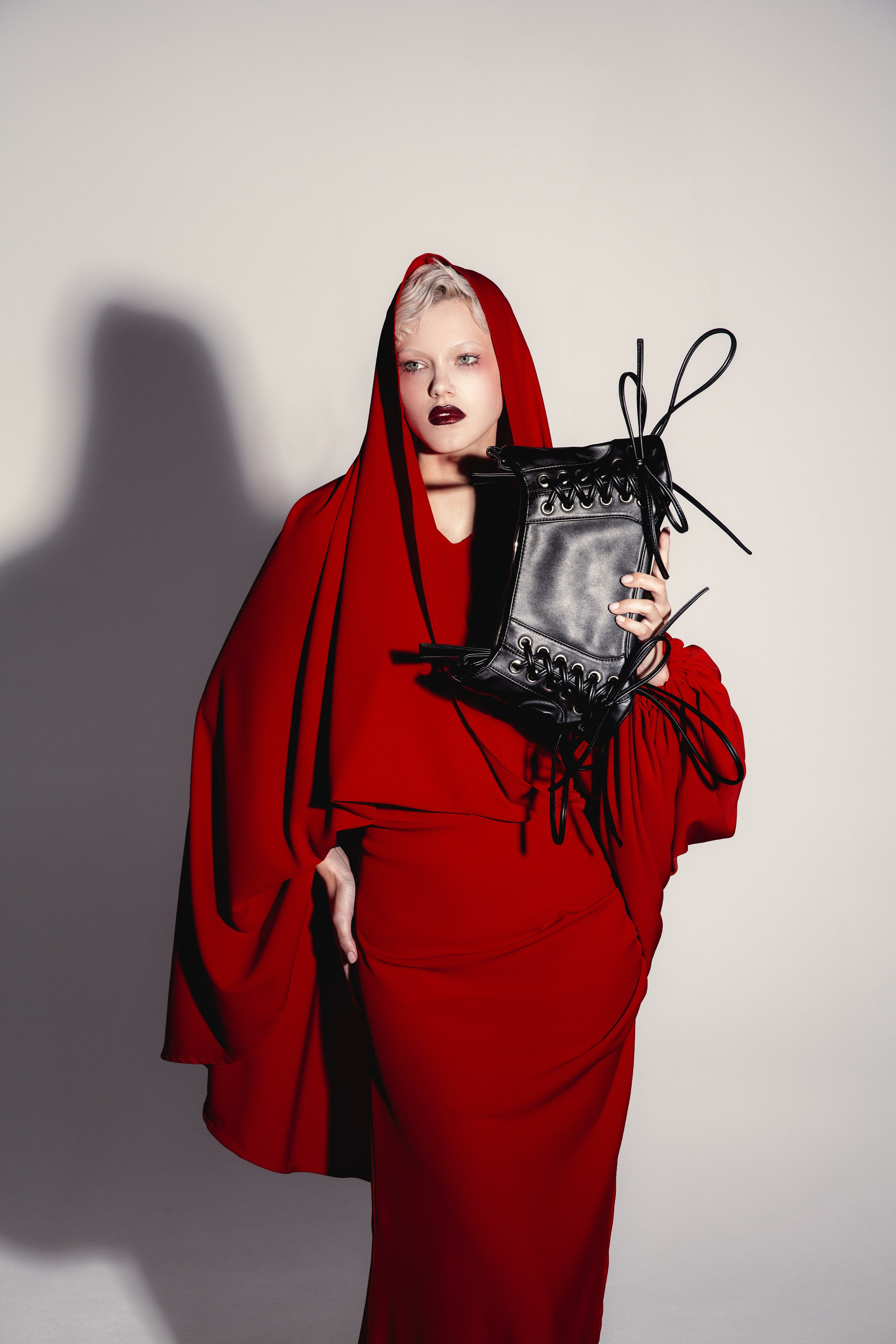 Red. Photographer. Producer. Retoucher