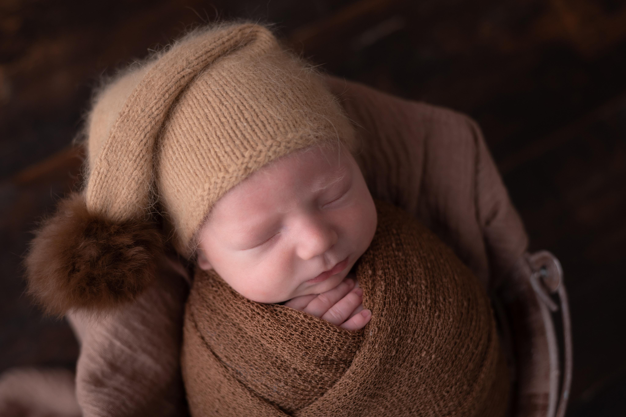 позирование новорожденных