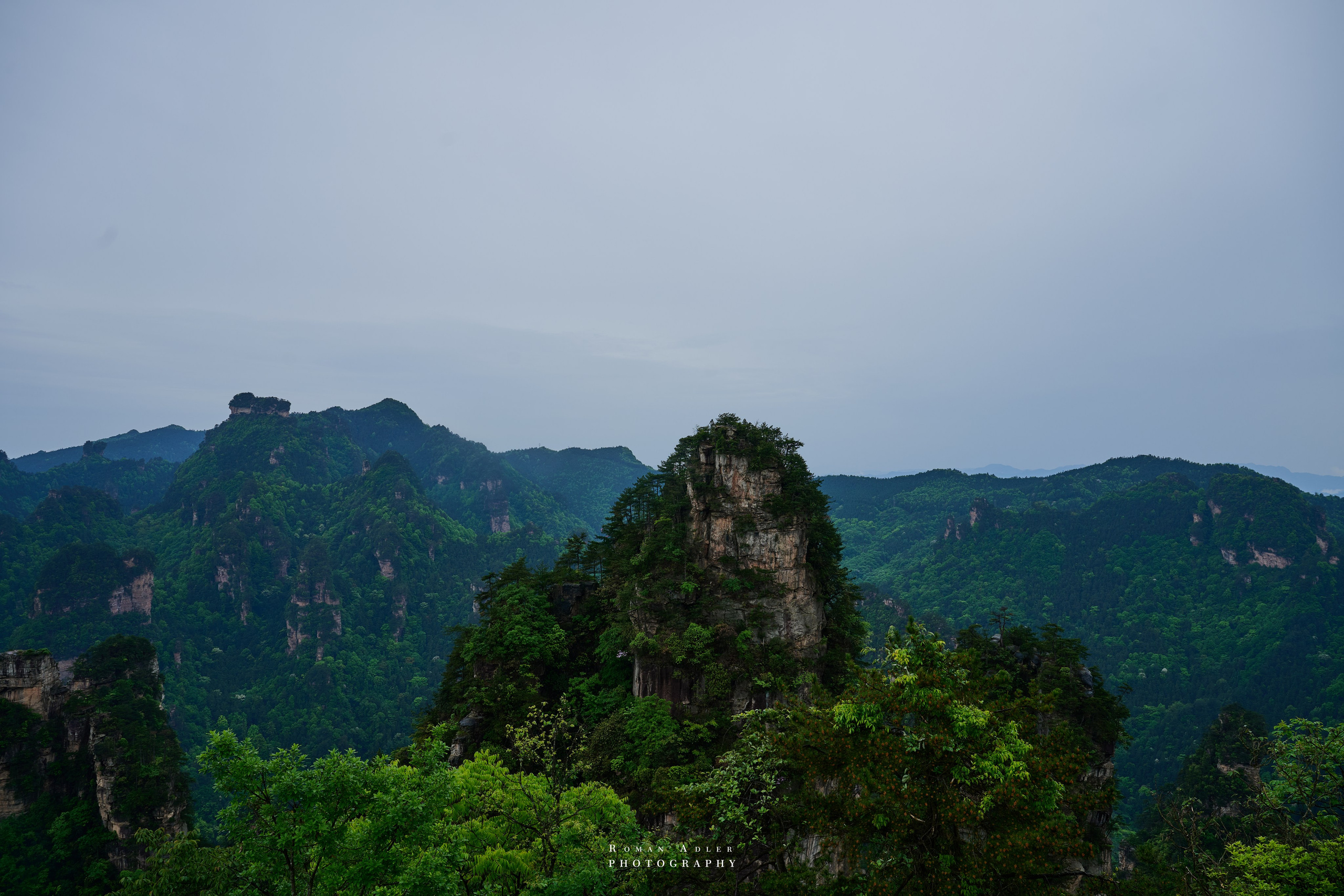 Zhangjiajie. Here, the sky seems to descend to the earth